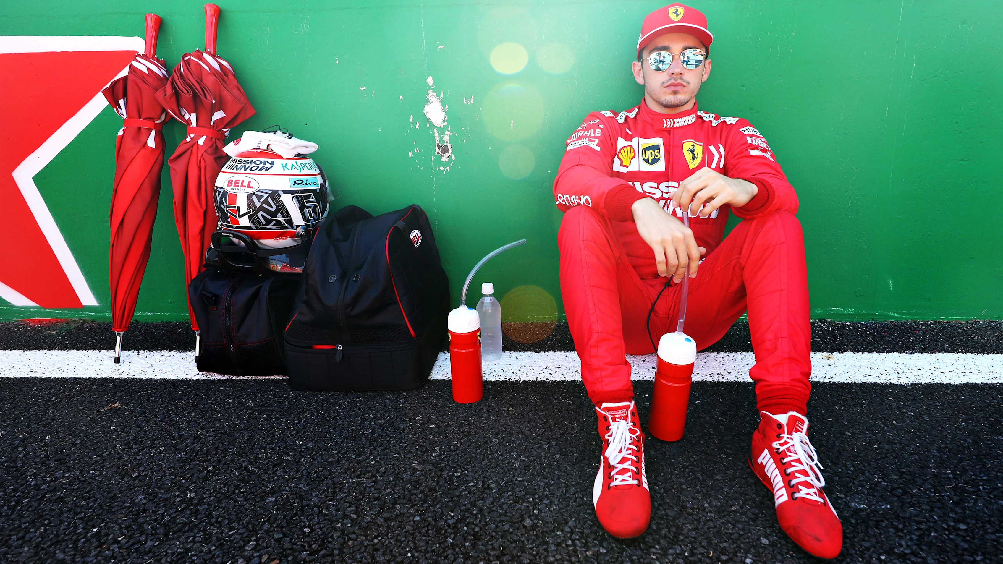 SUZUKA, JAPAN - OCTOBER 13: Charles Leclerc of Monaco and Ferrari prepares to drive on the grid