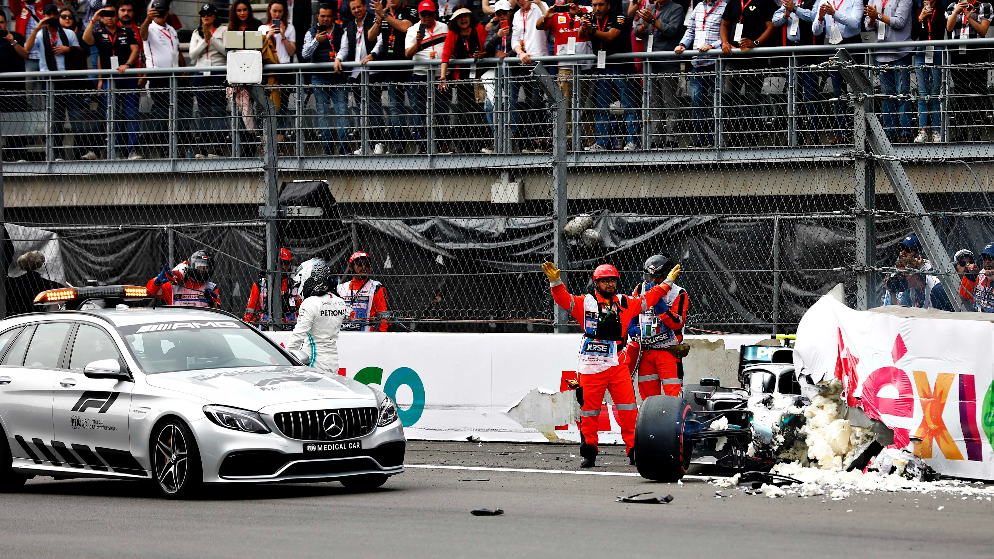 MEXICO CITY, MEXICO - OCTOBER 26: Valtteri Bottas of Finland and Mercedes GP walks from his car