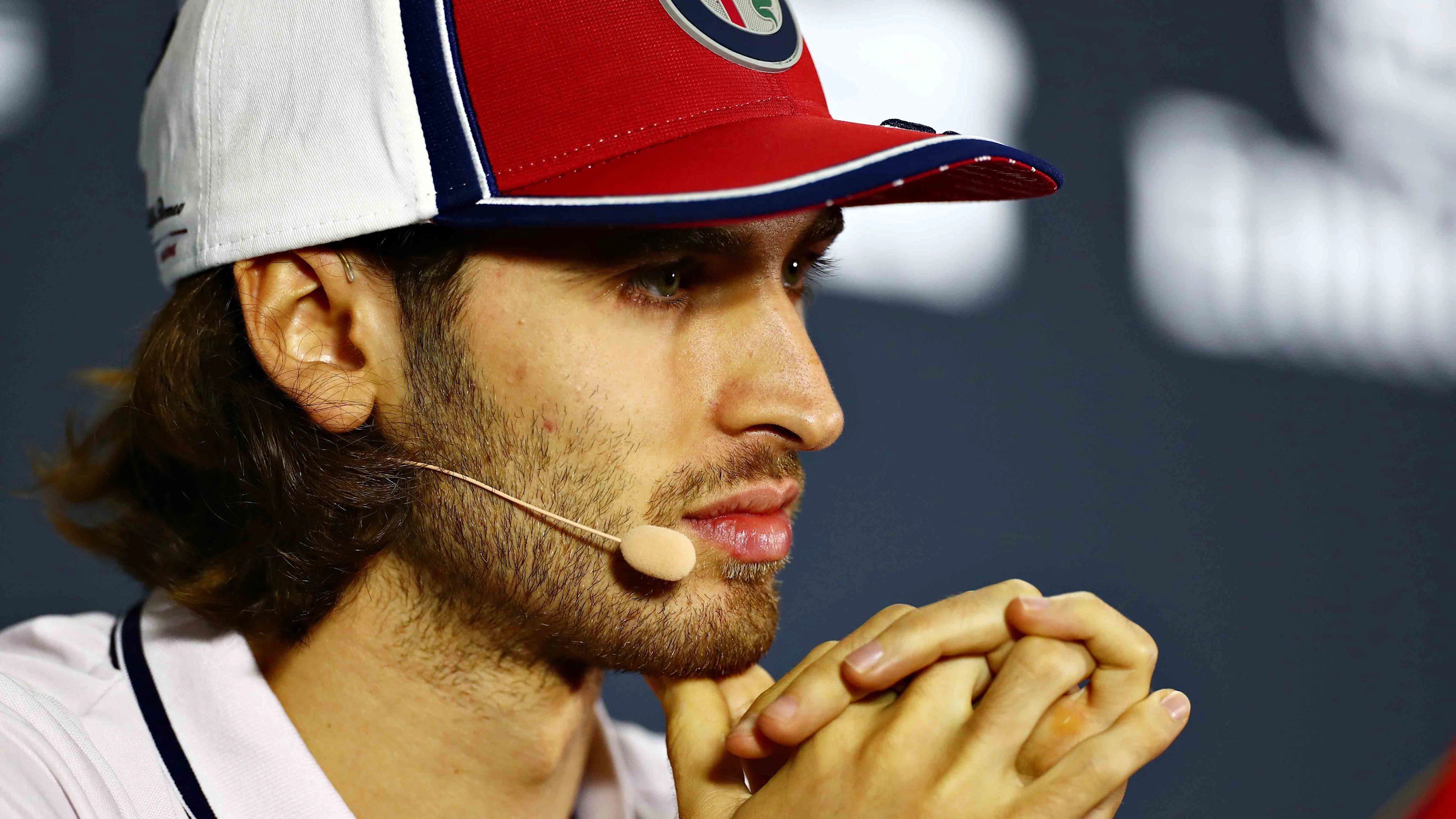 MEXICO CITY, MEXICO - OCTOBER 24: Antonio Giovinazzi of Italy and Alfa Romeo Racing talks in the