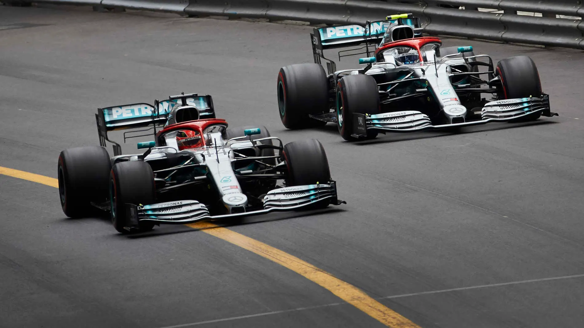 MONTE CARLO, MONACO - MAY 26: Lewis Hamilton, Mercedes AMG F1 W10, leads Valtteri Bottas, Mercedes