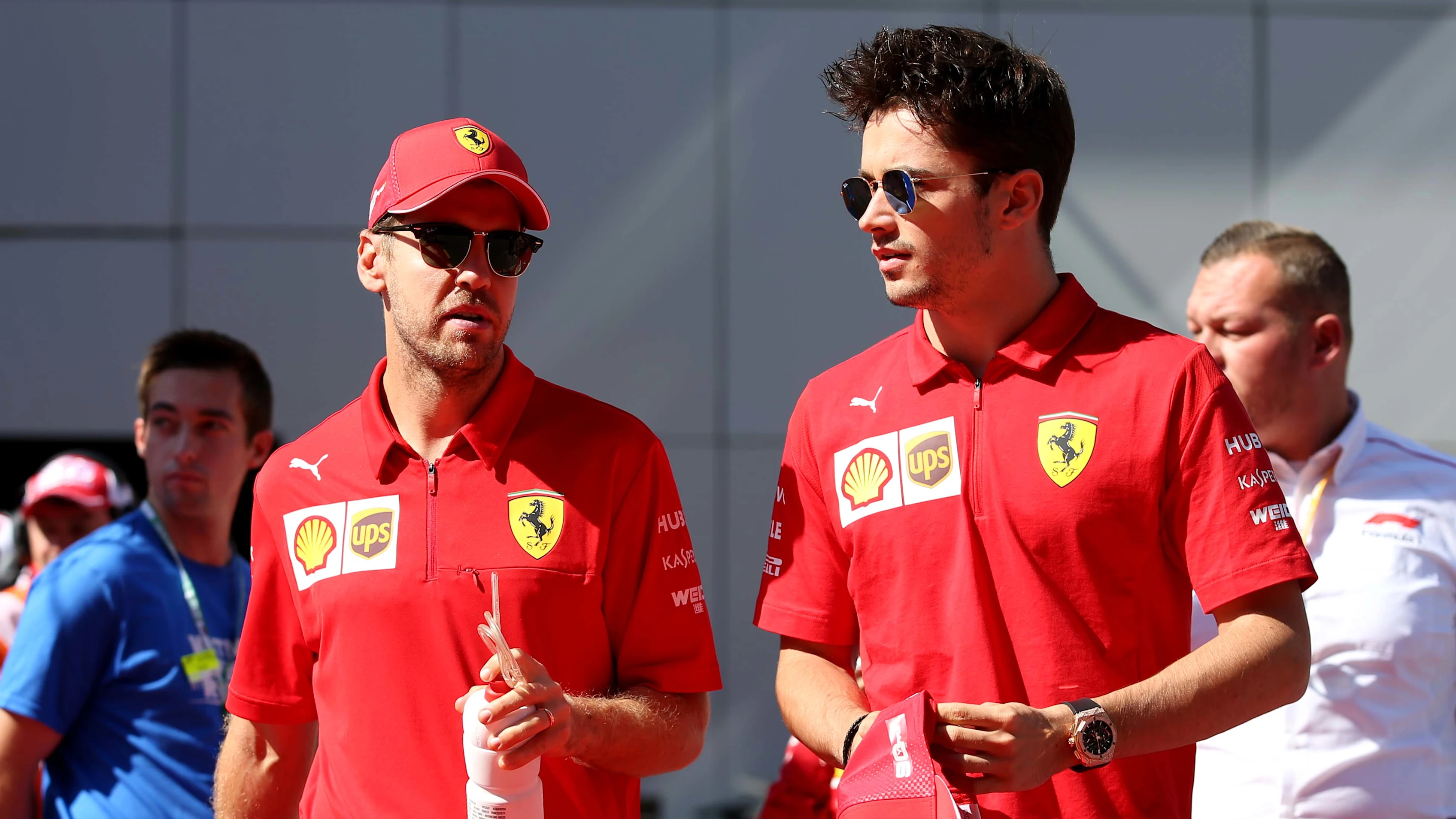 SOCHI, RUSSIA - SEPTEMBER 29: Charles Leclerc of Monaco and Ferrari and Sebastian Vettel of Germany