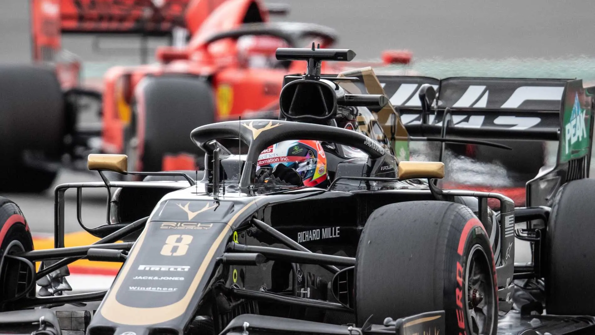CIRCUIT DE BARCELONA-CATALUNYA, SPAIN - MAY 11: Romain Grosjean, Haas VF-19, leads Charles Leclerc,