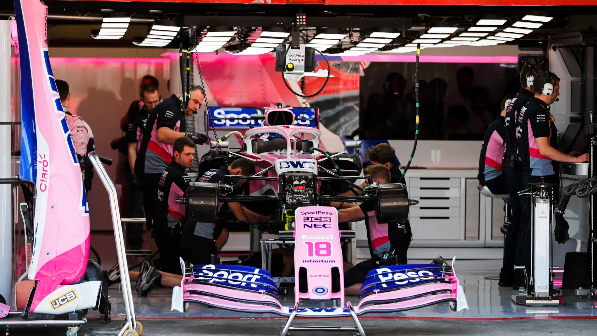 CIRCUIT DE BARCELONA-CATALUNYA, SPAIN - MAY 11: Mechanics work on the car of Lance Stroll, Racing Point RP19, in the garage during the Spanish GP at Circuit de Barcelona-Catalunya on May 11, 2019 in Circuit de Barcelona-Catalunya, Spain. (Photo by Steven Tee / LAT Images)