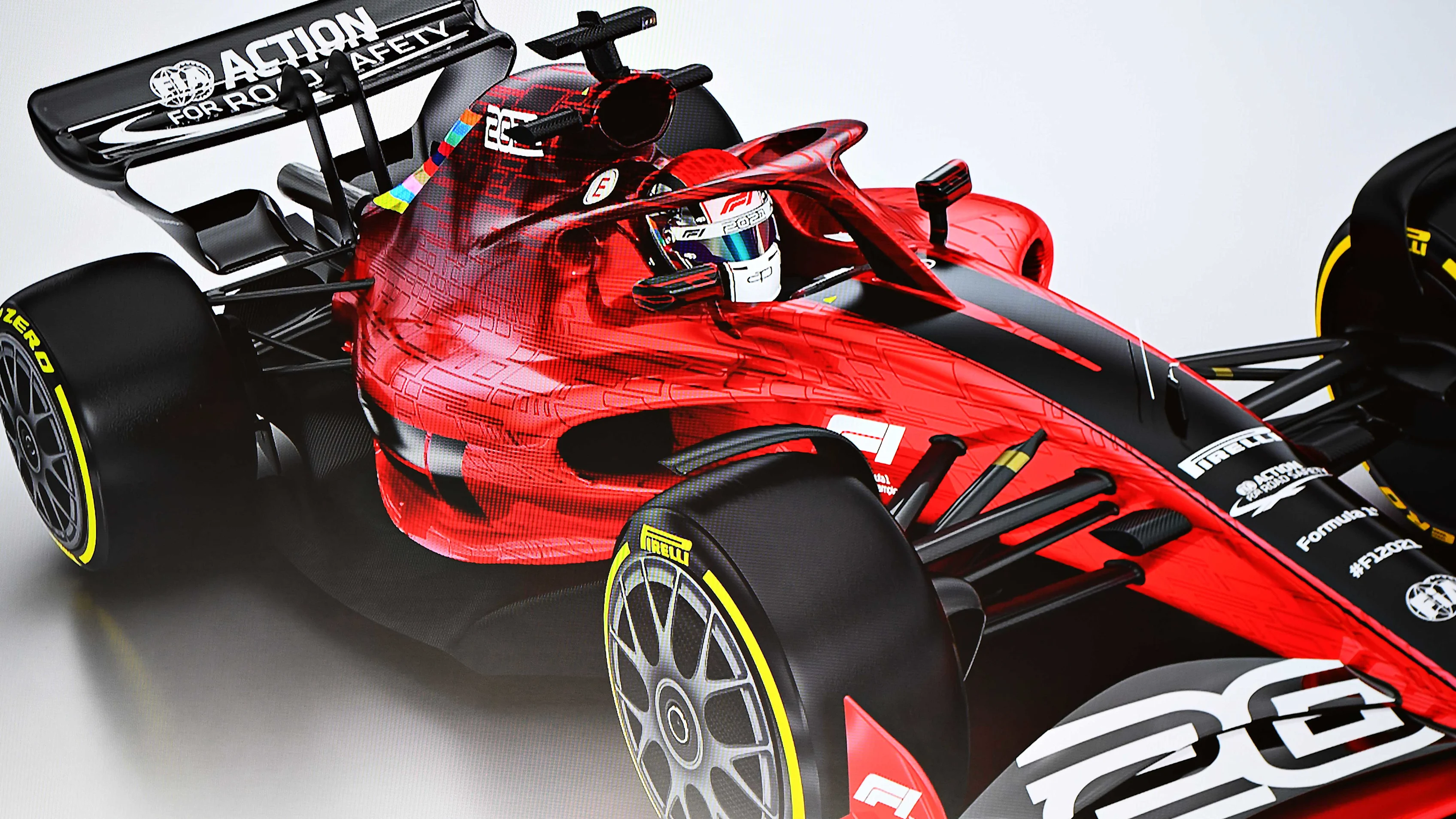 AUSTIN, TEXAS - OCTOBER 31: A mockup of a car is shown on a screen in a press conference to