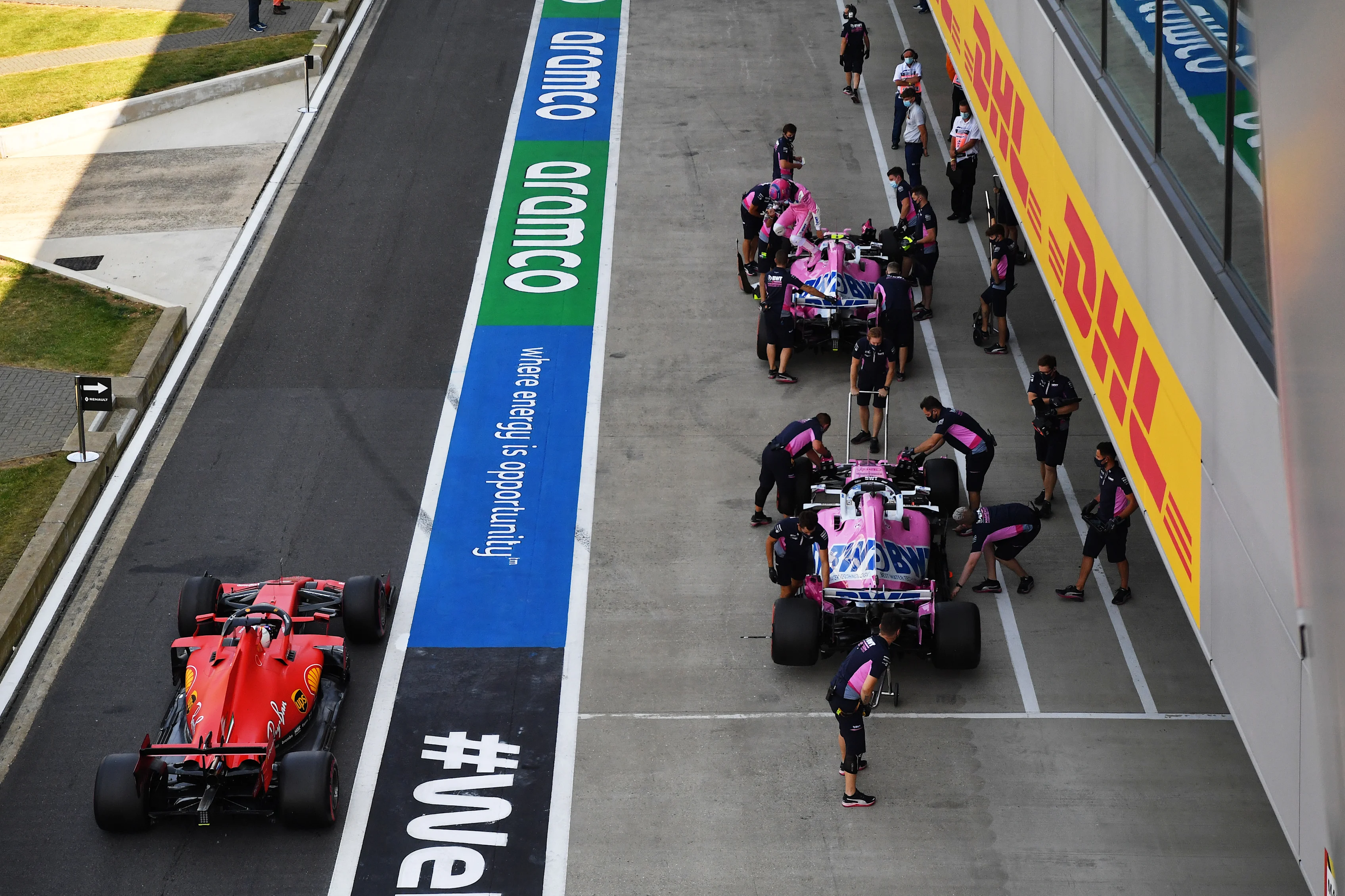NORTHAMPTON, ENGLAND - AUGUST 08: Sebastian Vettel of Germany driving the (5) Scuderia Ferrari