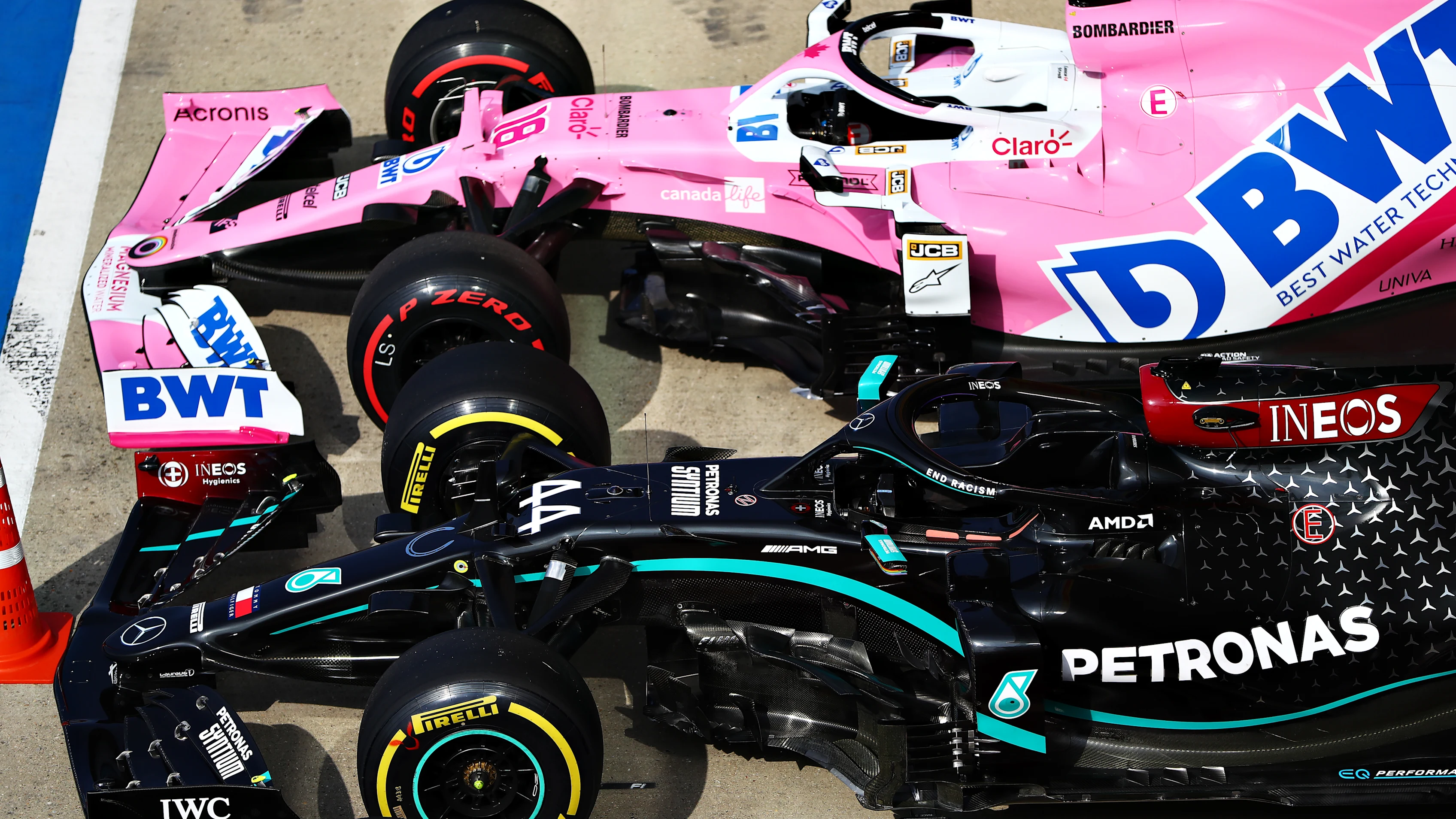 NORTHAMPTON, ENGLAND - AUGUST 08: The cars of Lewis Hamilton of Great Britain and Mercedes GP and