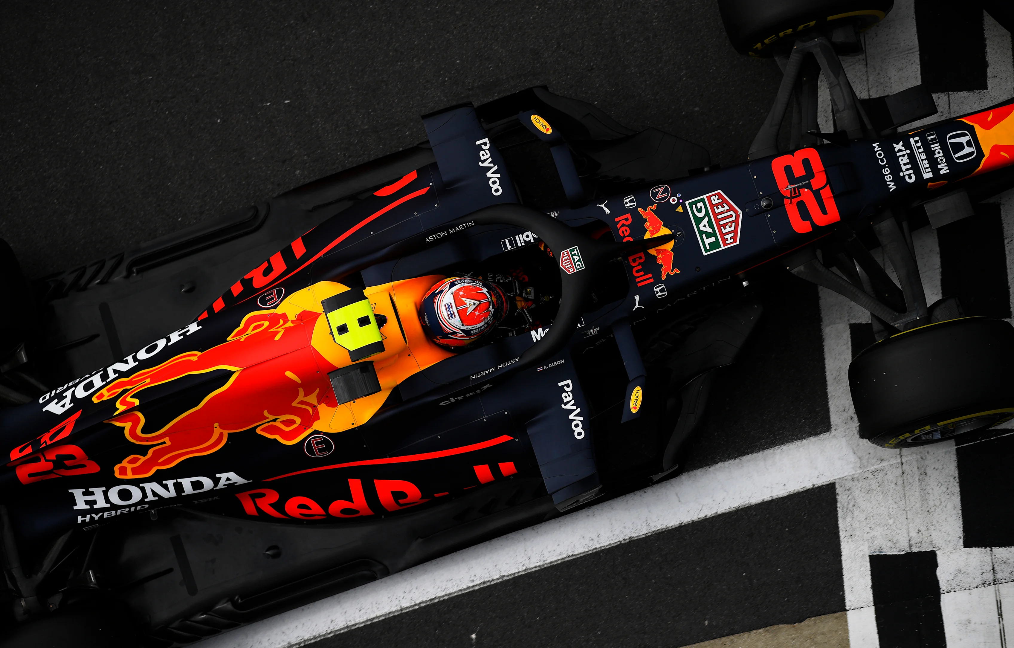 NORTHAMPTON, ENGLAND - AUGUST 08: Alexander Albon of Thailand driving the (23) Aston Martin Red