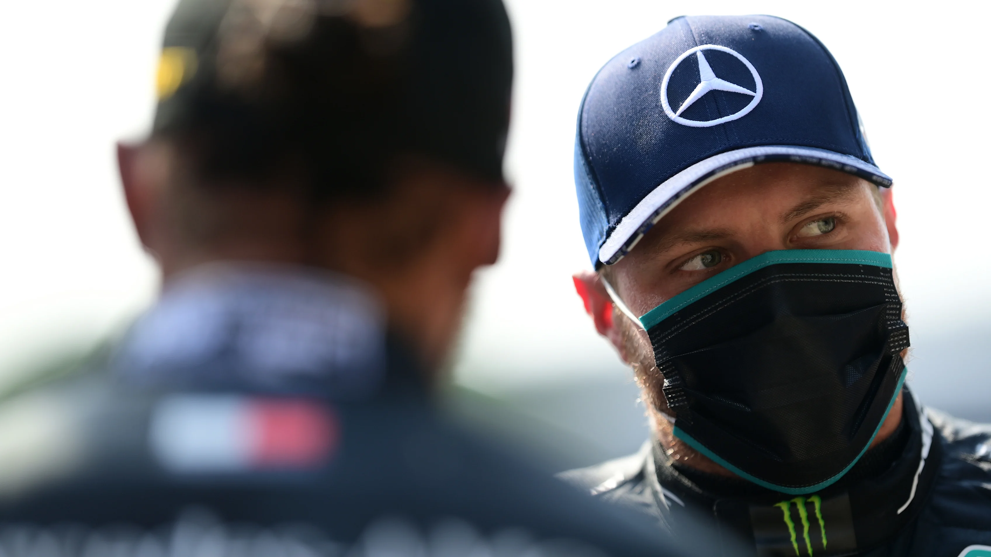 NORTHAMPTON, ENGLAND - AUGUST 09: Valtteri Bottas of Finland and Mercedes GP looks on during the F1