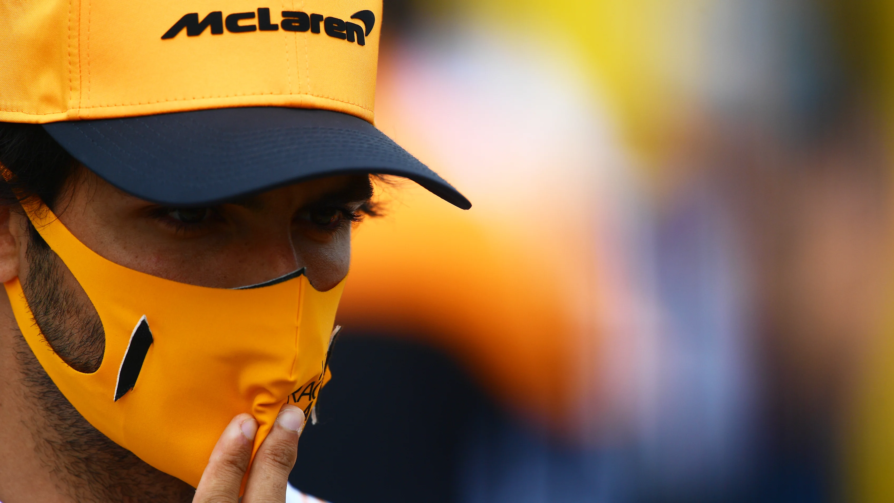 NORTHAMPTON, ENGLAND - AUGUST 06: Carlos Sainz of Spain and McLaren F1 talks to the media in the