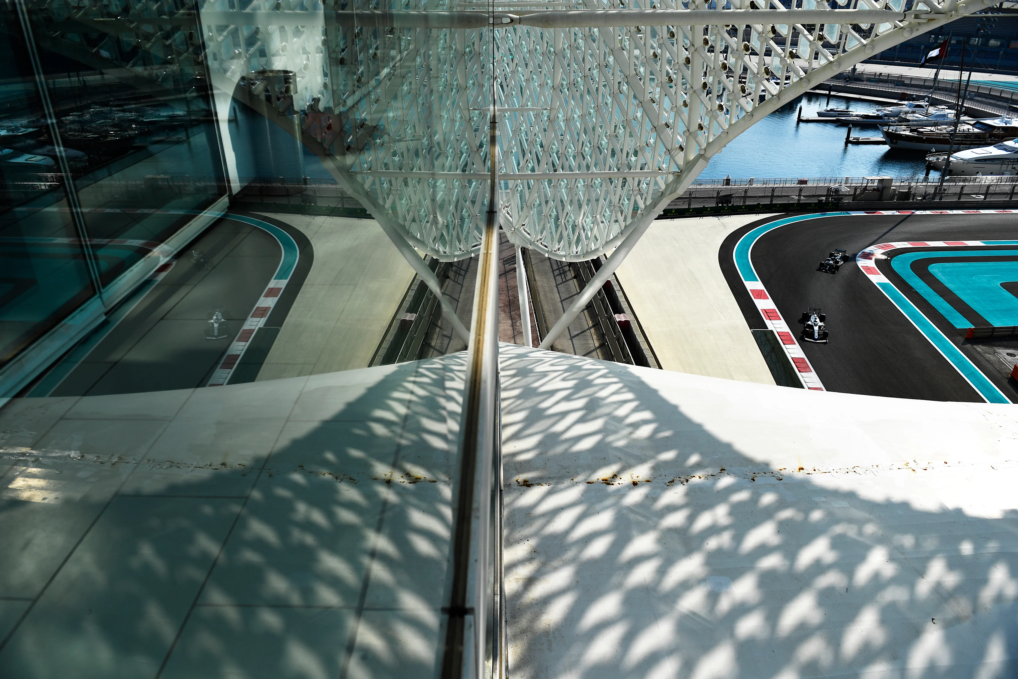 ABU DHABI, UNITED ARAB EMIRATES - DECEMBER 12: George Russell of Great Britain driving the (63) Williams Racing FW43 Mercedes and Valtteri Bottas of Finland driving the (77) Mercedes AMG Petronas F1 Team Mercedes W11 on track during final practice ahead of the F1 Grand Prix of Abu Dhabi at Yas Marina Circuit on December 12, 2020 in Abu Dhabi, United Arab Emirates. (Photo by Rudy Carezzevoli/Getty Images)