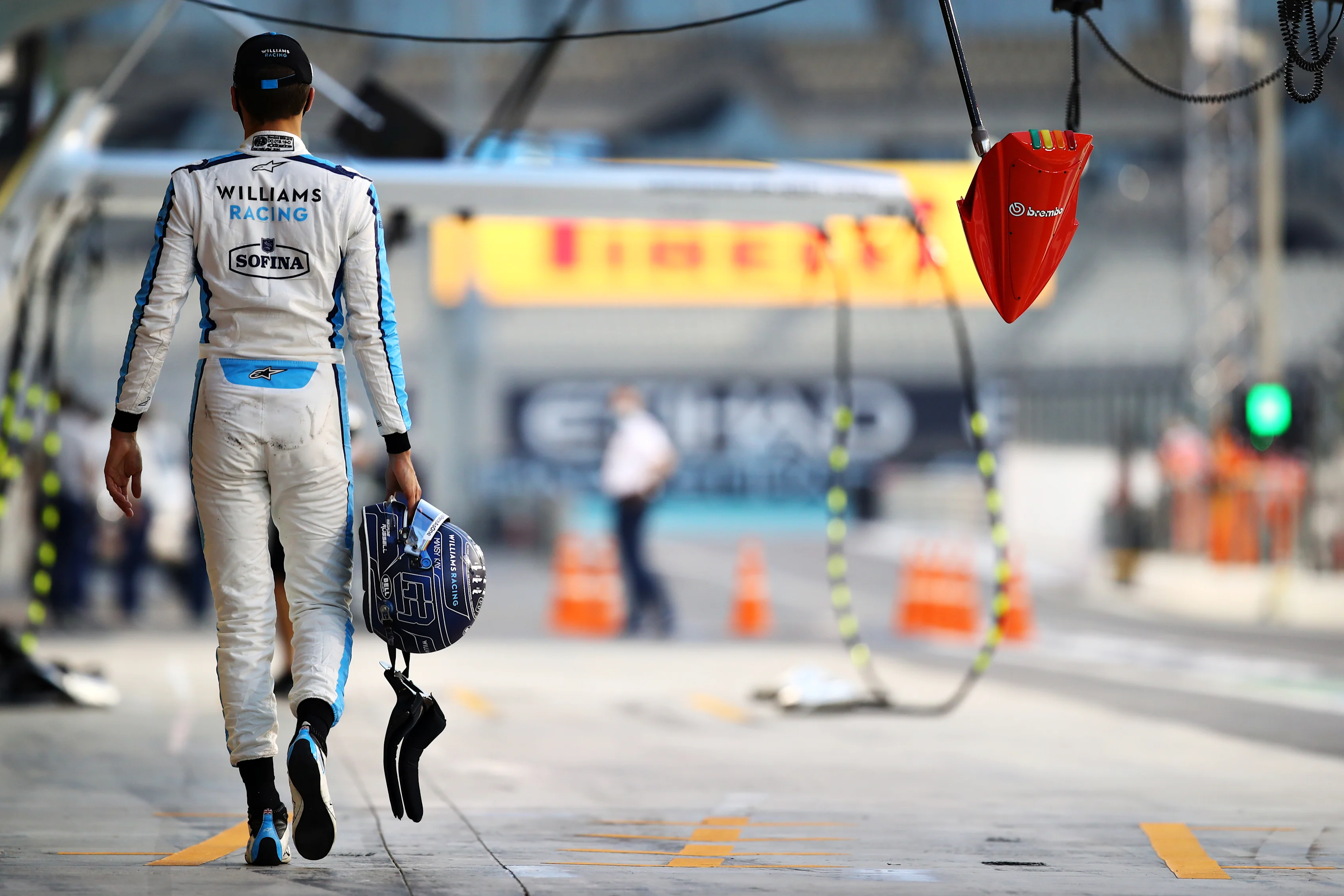 ABU DHABI, UNITED ARAB EMIRATES - DECEMBER 12: George Russell of Great Britain and Williams walks