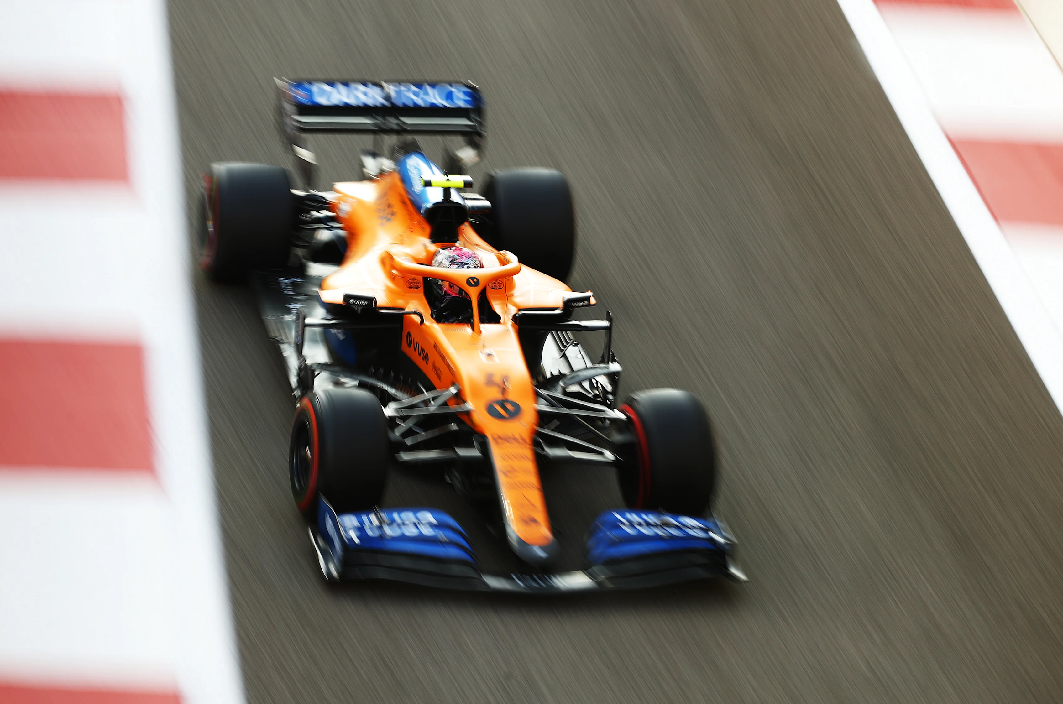ABU DHABI, UNITED ARAB EMIRATES - DECEMBER 13: Lando Norris of Great Britain driving the (4)