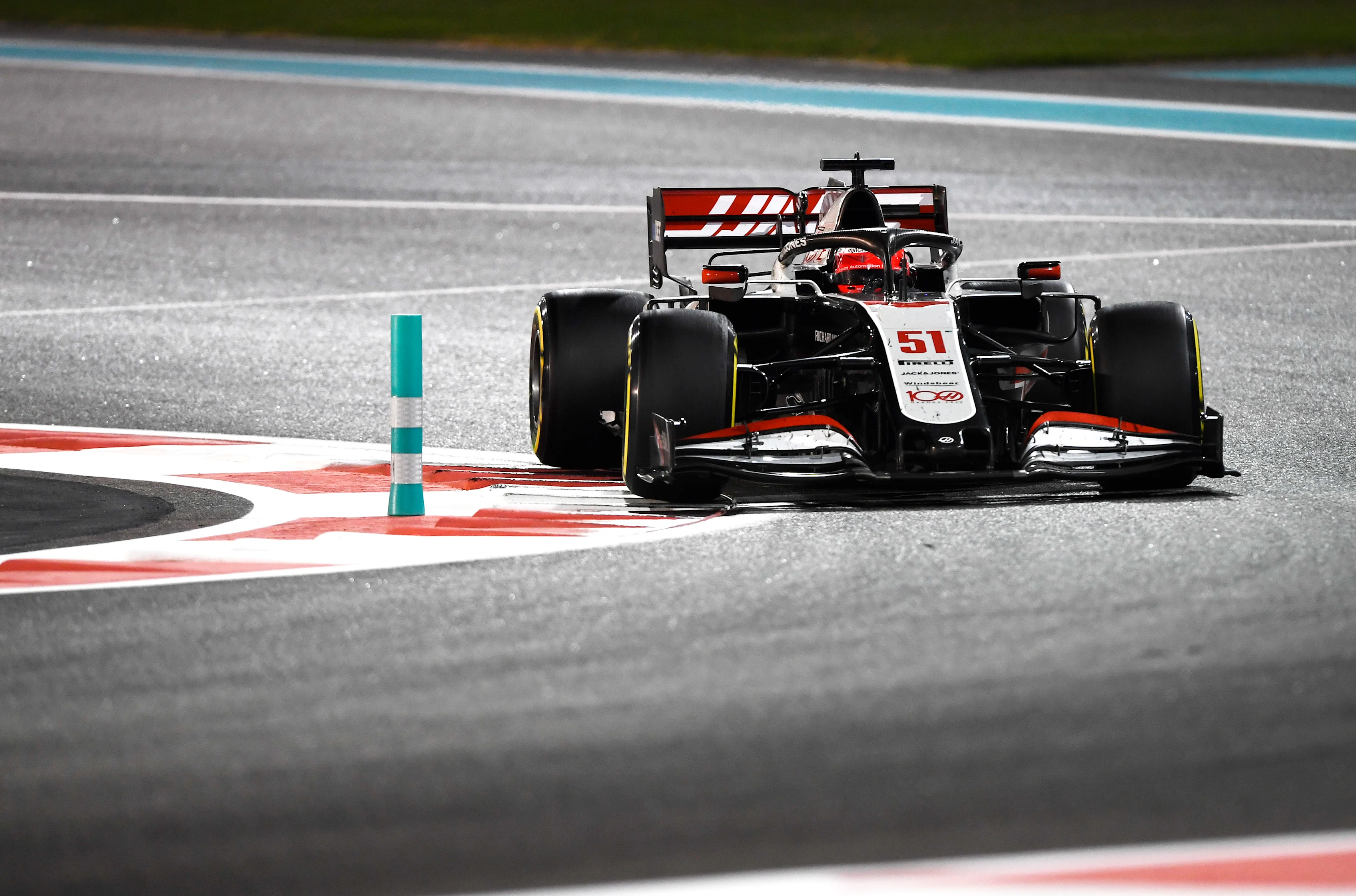 ABU DHABI, UNITED ARAB EMIRATES - DECEMBER 13: Pietro Fittipaldi of Brazil driving the (51) Haas F1 Team VF-20 Ferrari during the F1 Grand Prix of Abu Dhabi at Yas Marina Circuit on December 13, 2020 in Abu Dhabi, United Arab Emirates. (Photo by Rudy Carezzevoli/Getty Images)