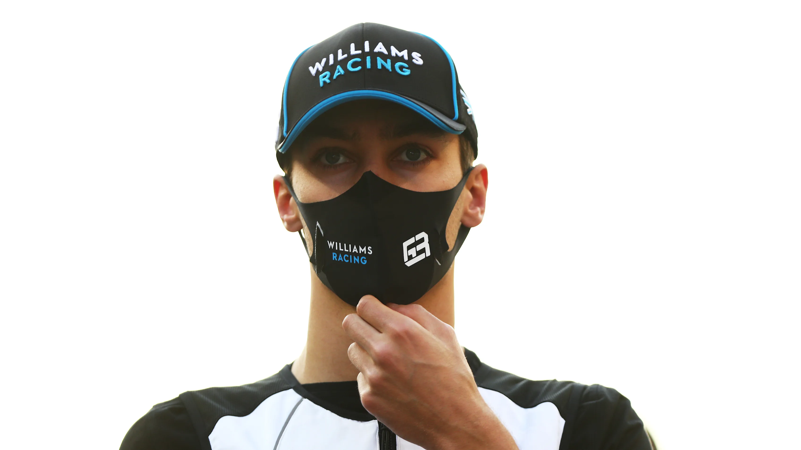 ABU DHABI, UNITED ARAB EMIRATES - DECEMBER 13: George Russell of Great Britain and Williams looks on from the grid prior to during the F1 Grand Prix of Abu Dhabi at Yas Marina Circuit on December 13, 2020 in Abu Dhabi, United Arab Emirates. (Photo by Dan Istitene - Formula 1/Formula 1 via Getty Images)