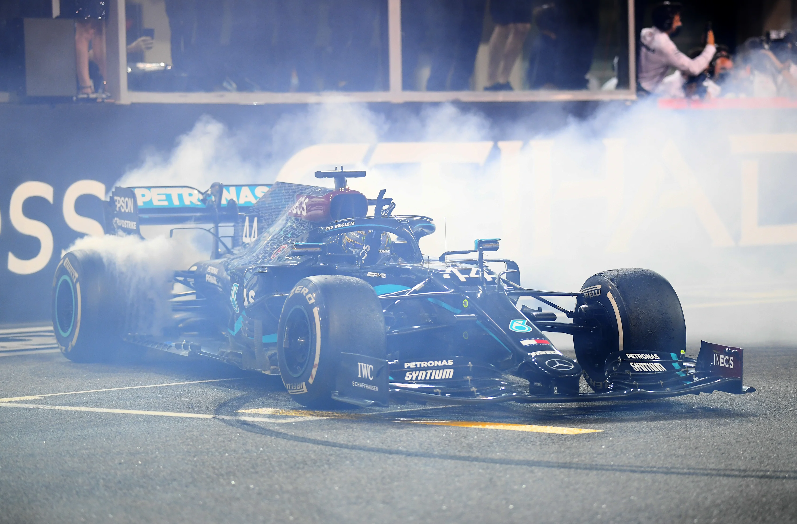 ABU DHABI, UNITED ARAB EMIRATES - DECEMBER 13: Third placed Lewis Hamilton of Great Britain driving