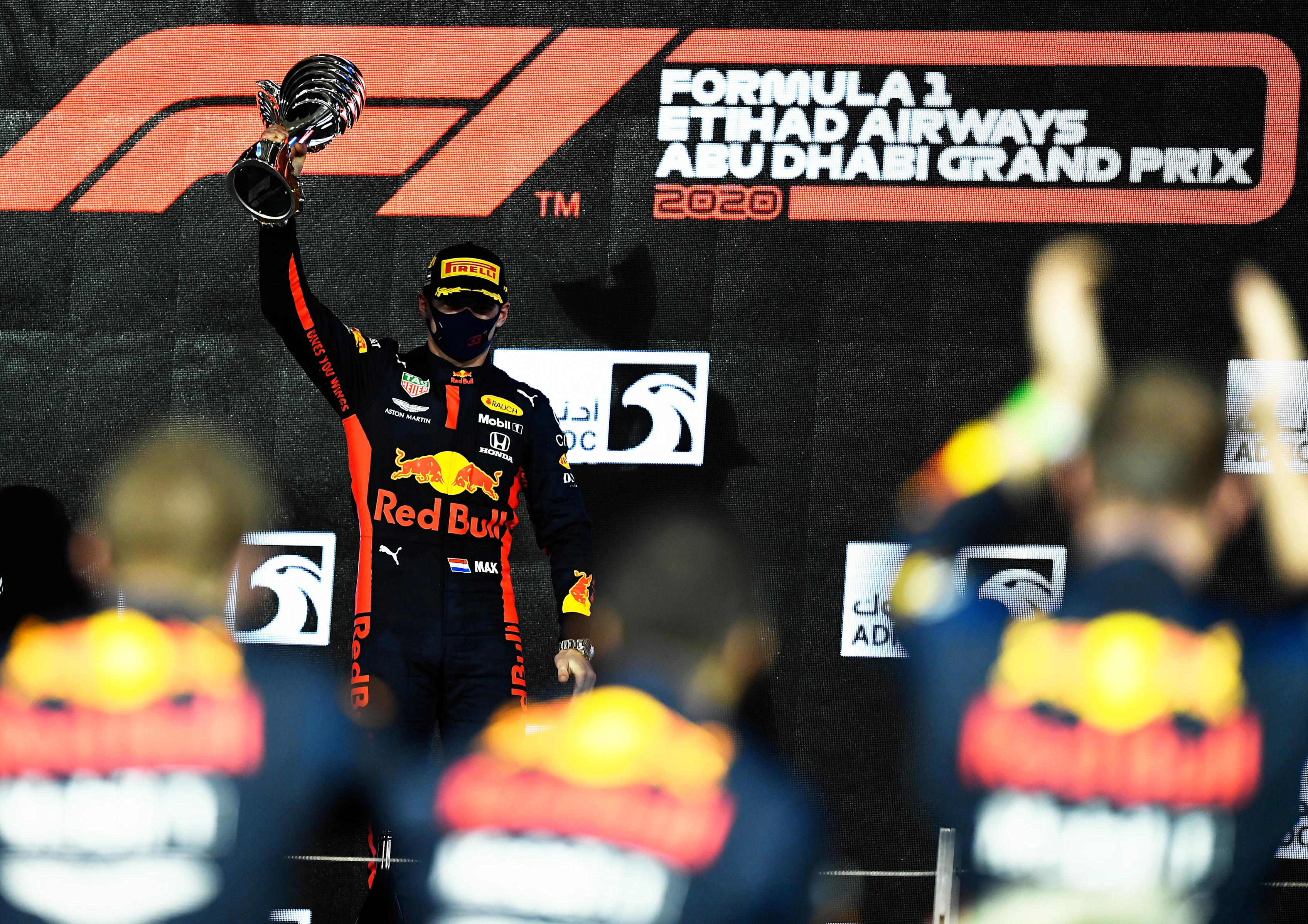 ABU DHABI, UNITED ARAB EMIRATES - DECEMBER 13: Race winner Max Verstappen of Netherlands and Red