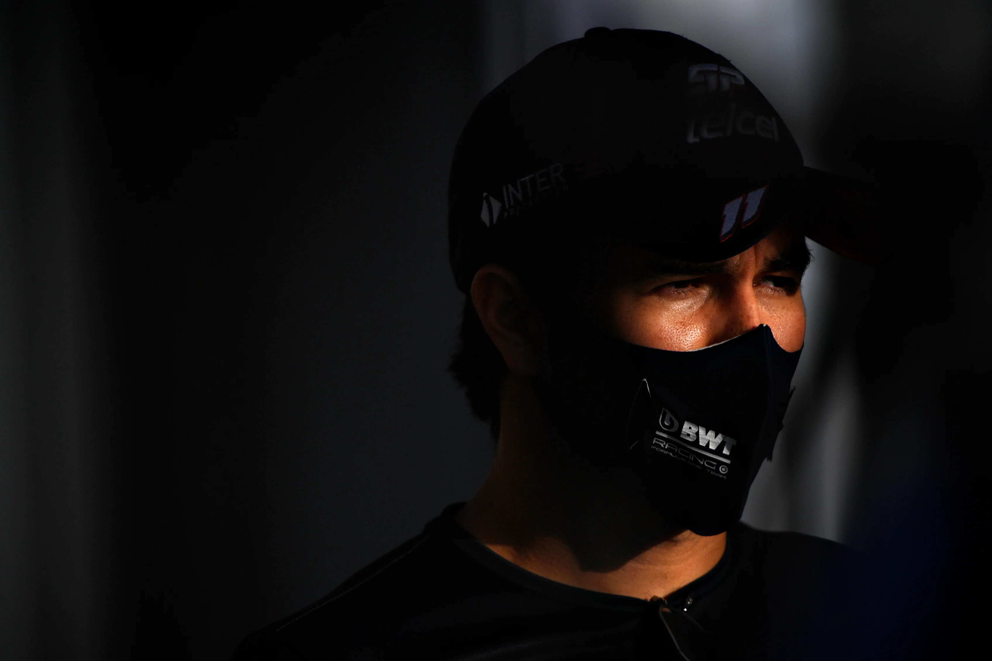 ABU DHABI, UNITED ARAB EMIRATES - DECEMBER 10: Sergio Perez of Mexico and Racing Point talks to the