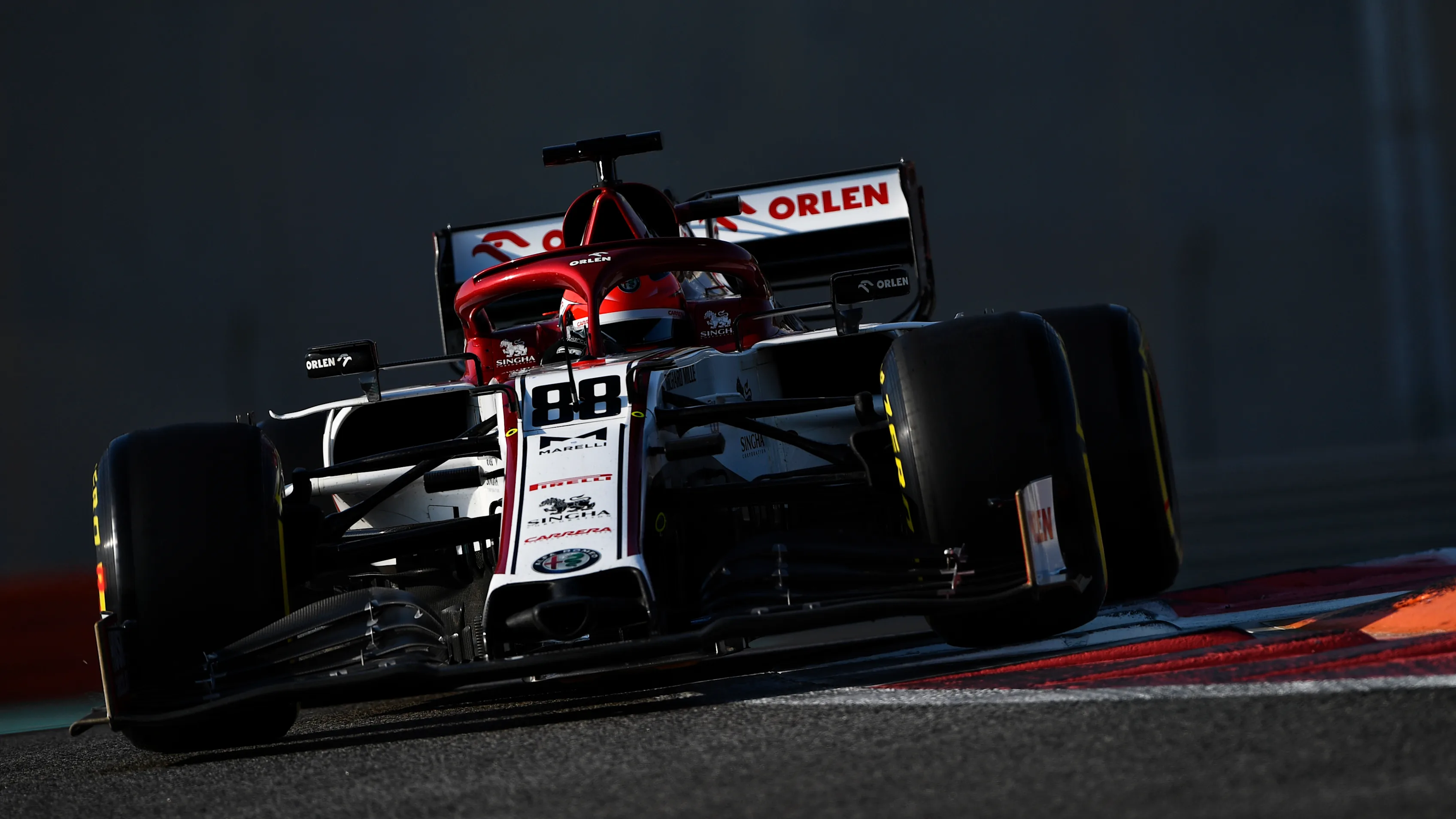 ABU DHABI, UNITED ARAB EMIRATES - DECEMBER 15: Robert Kubica of Poland driving the (88) Alfa Romeo