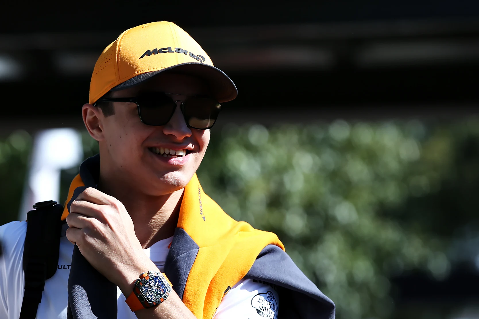 MELBOURNE, AUSTRALIA - MARCH 12: Lando Norris of Great Britain and McLaren F1 walks in the Paddock
