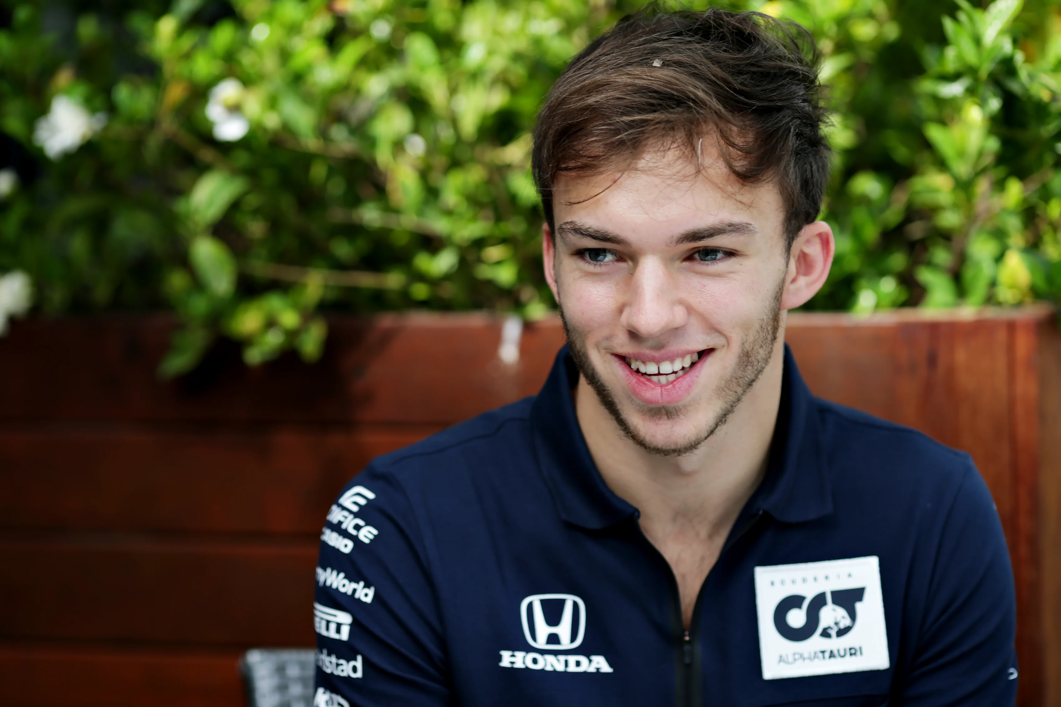 MELBOURNE, AUSTRALIA - MARCH 12: Pierre Gasly of France and Scuderia AlphaTauri talks to the media