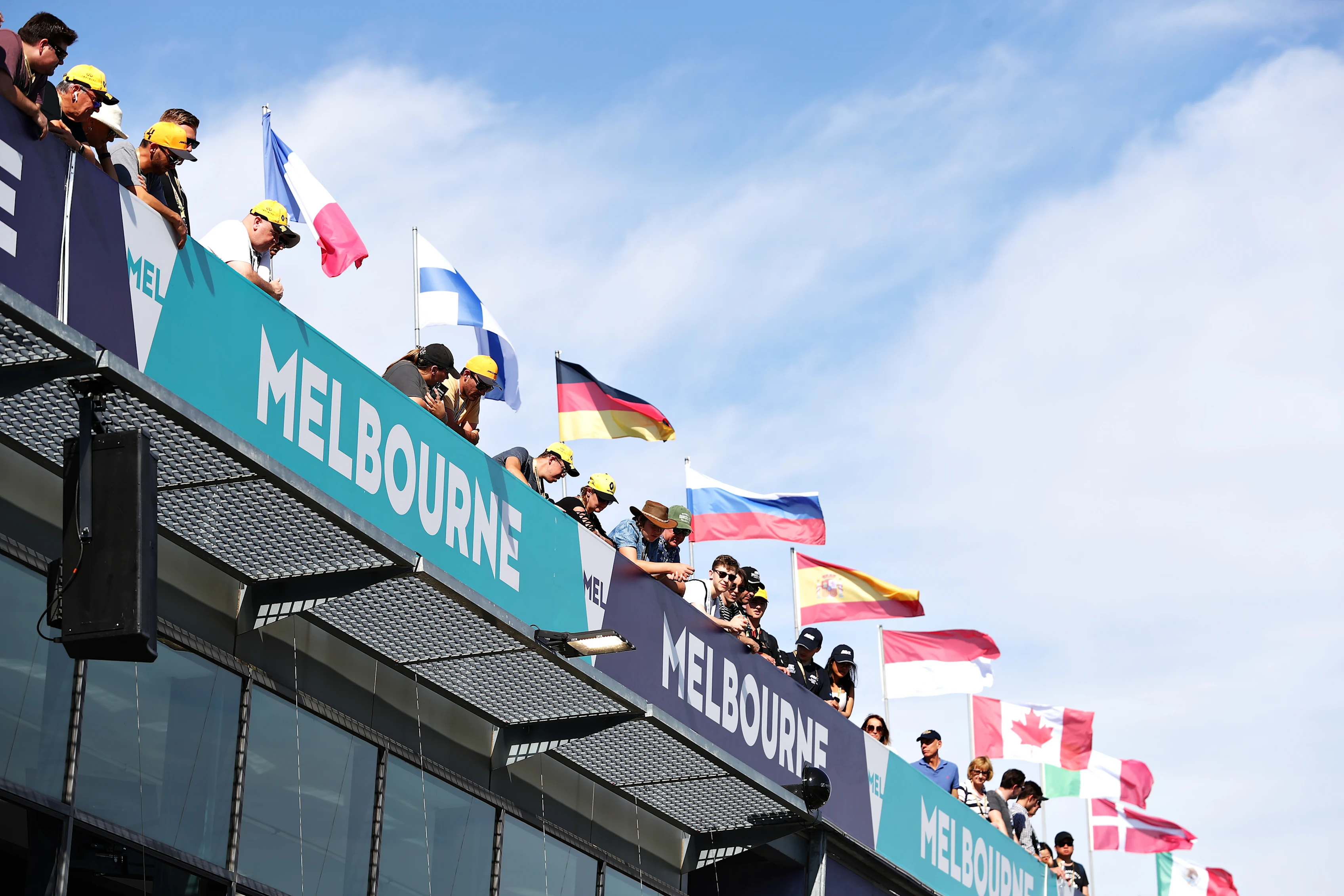 MELBOURNE, AUSTRALIA - MARCH 12: Fans watch over from above the pitlane during previews ahead of