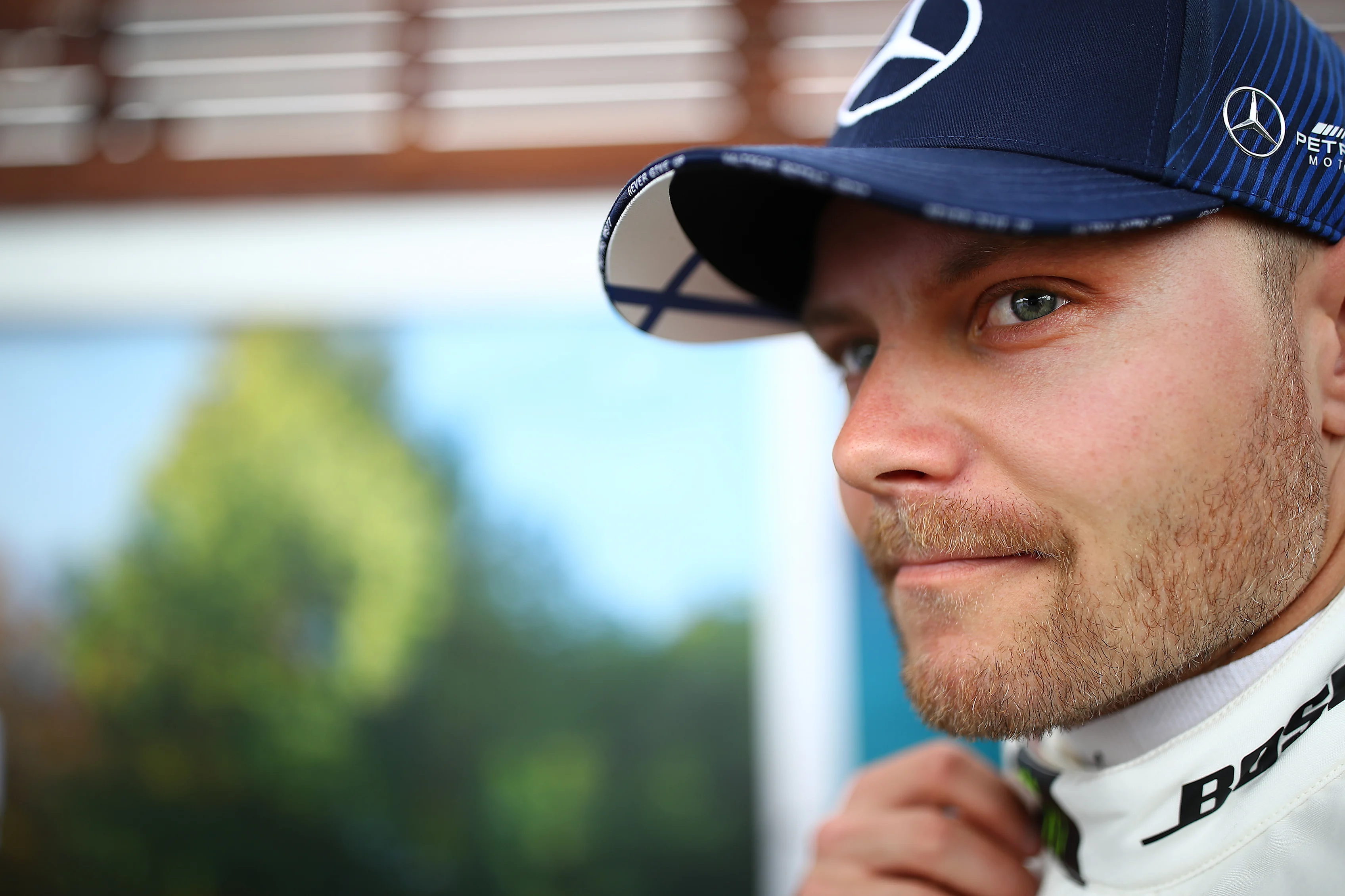 MELBOURNE, AUSTRALIA - MARCH 12: Valtteri Bottas of Finland and Mercedes GP looks on as he walks