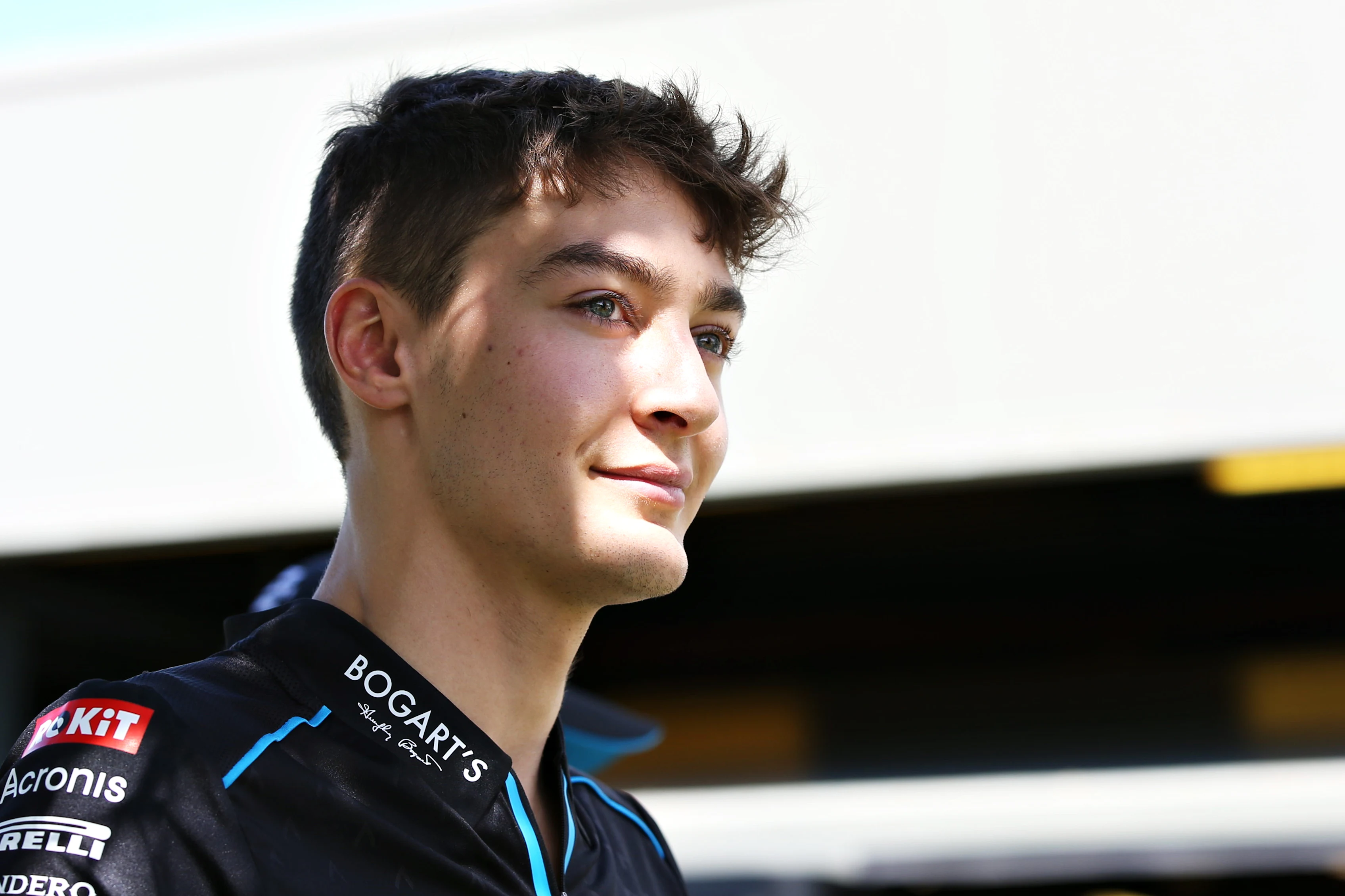 MELBOURNE, AUSTRALIA - MARCH 12: George Russell of Great Britain and Williams walks in the Paddock