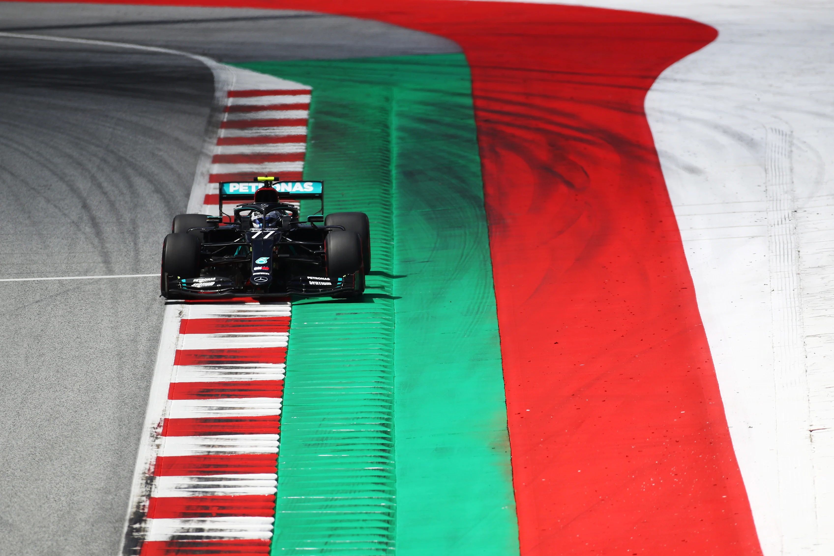 SPIELBERG, AUSTRIA - JULY 04: Valtteri Bottas of Finland driving the (77) Mercedes AMG Petronas F1 Team Mercedes W11 on track during qualifying for the Formula One Grand Prix of Austria at Red Bull Ring on July 04, 2020 in Spielberg, Austria. (Photo by Mark Thompson/Getty Images)