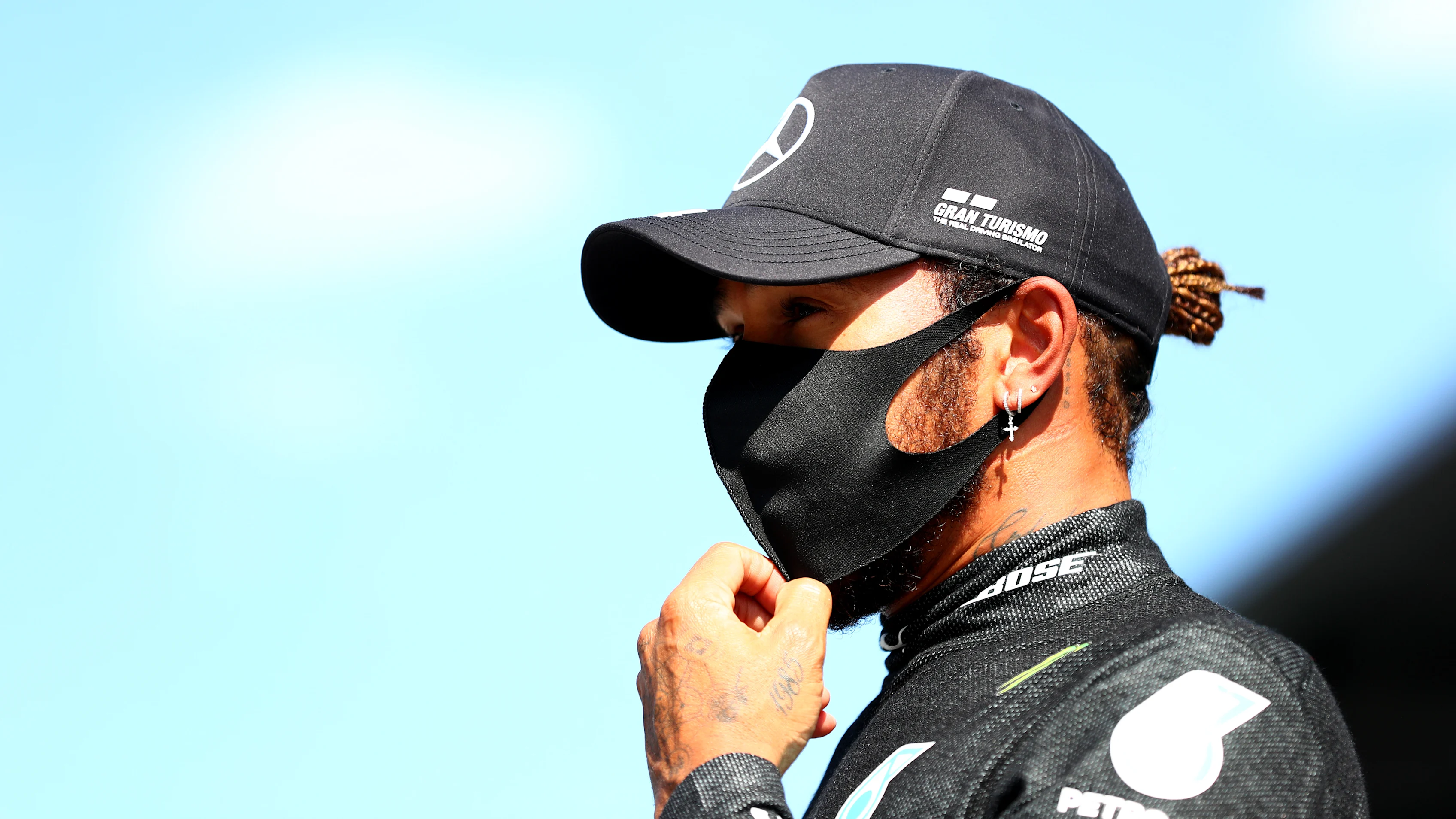 SPIELBERG, AUSTRIA - JULY 04:  Lewis Hamilton of Great Britain and Mercedes GP talks to the media