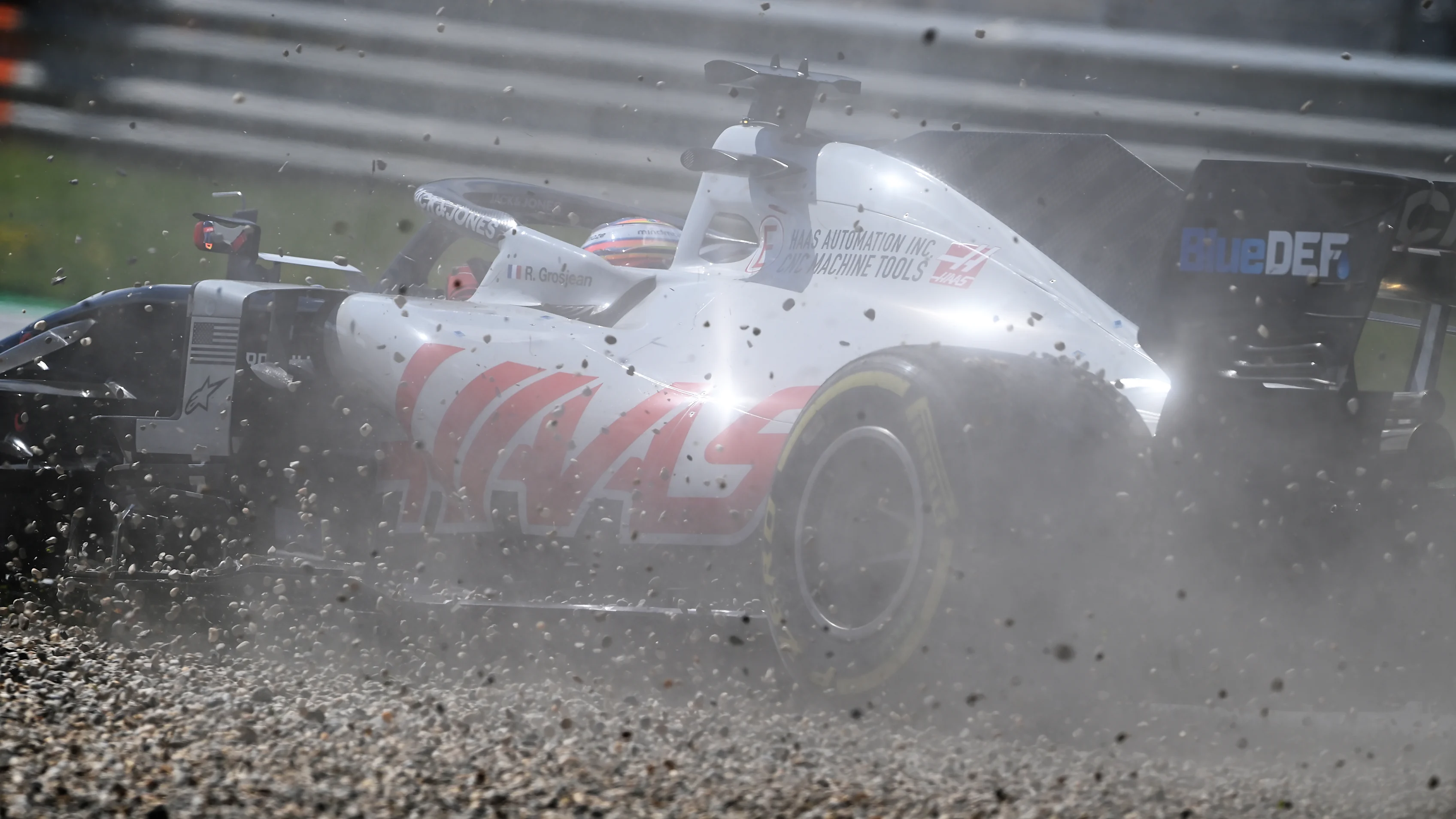 SPIELBERG, AUSTRIA - JULY 05: Romain Grosjean of France driving the (8) Haas F1 Team VF-20 Ferrari runs wide during the Formula One Grand Prix of Austria at Red Bull Ring on July 05, 2020 in Spielberg, Austria. (Photo by Clive Mason - Formula 1/Formula 1 via Getty Images)