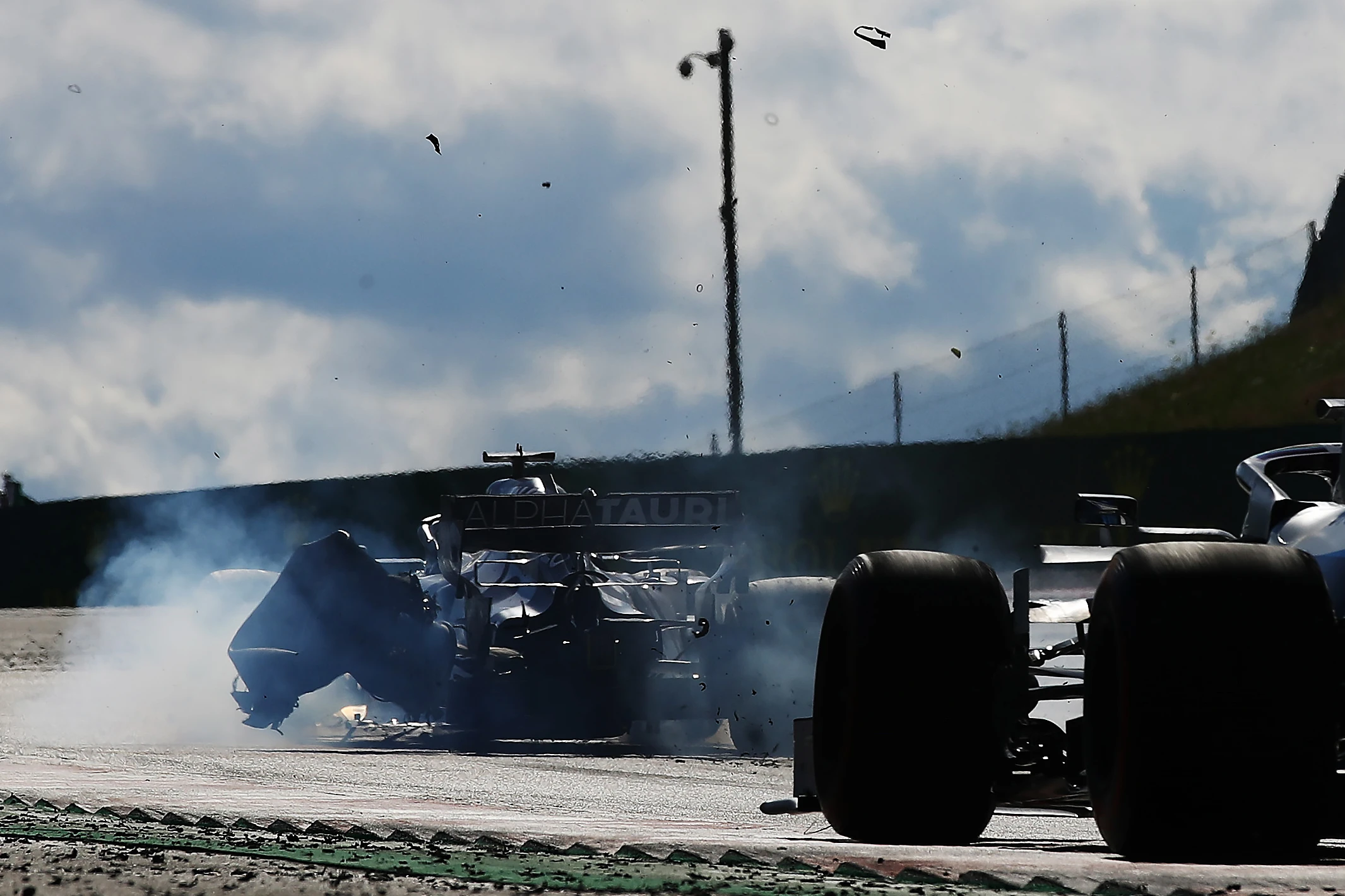 SPIELBERG, AUSTRIA - JULY 05: The rear left tyre of Daniil Kvyat of Russia driving the (26)