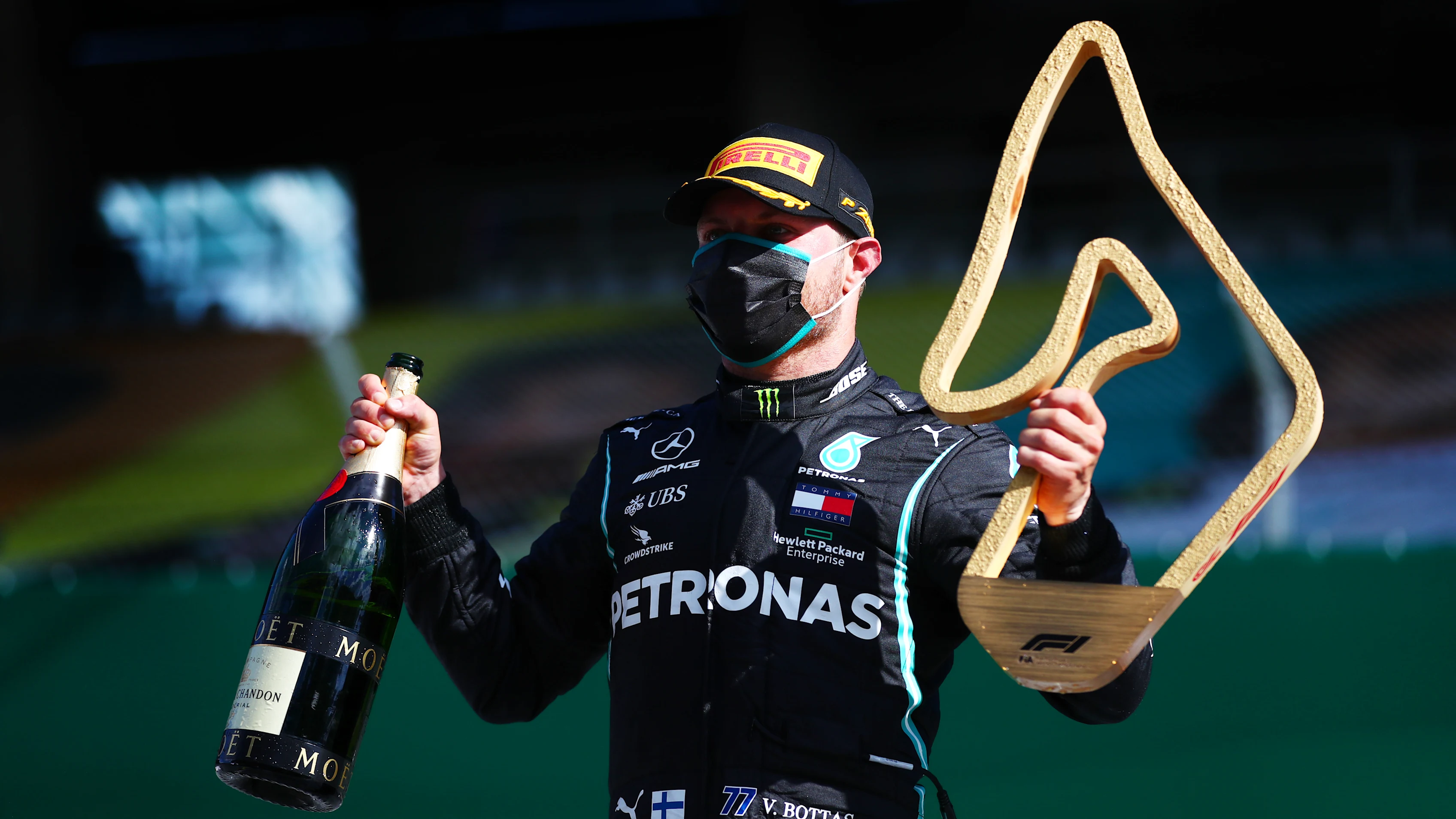 SPIELBERG, AUSTRIA - JULY 05: Race winner Valtteri Bottas of Finland and Mercedes GP poses with the