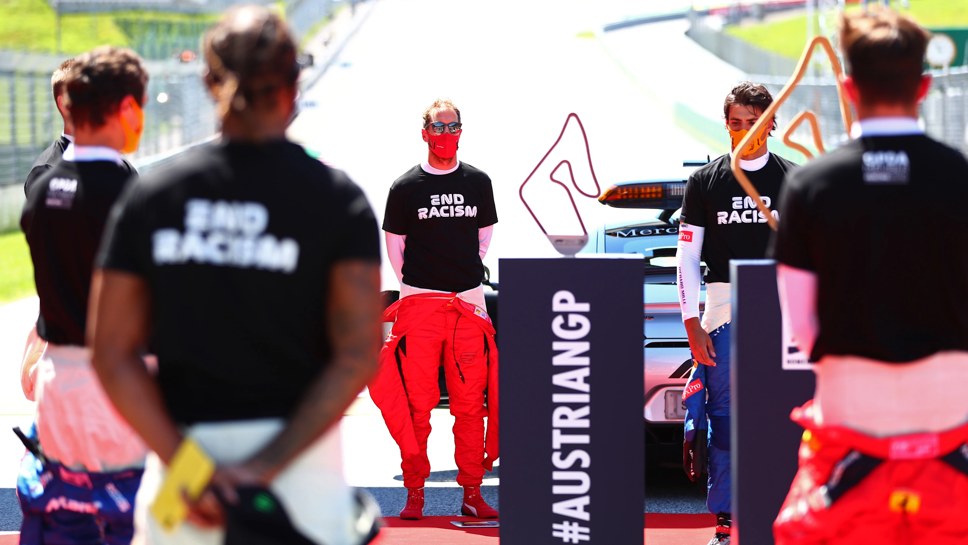 SPIELBERG, AUSTRIA - JULY 05: Sebastian Vettel of Germany and Ferrari is seen as the drivers stand