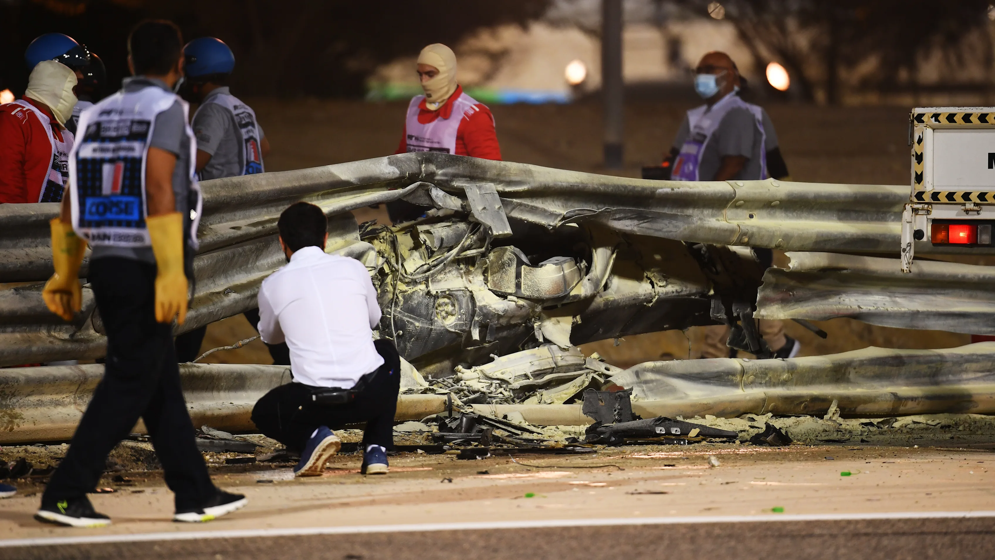 BAHRAIN, BAHRAIN - NOVEMBER 29: FIA Race Director Michael Masi inspects the damage to the track