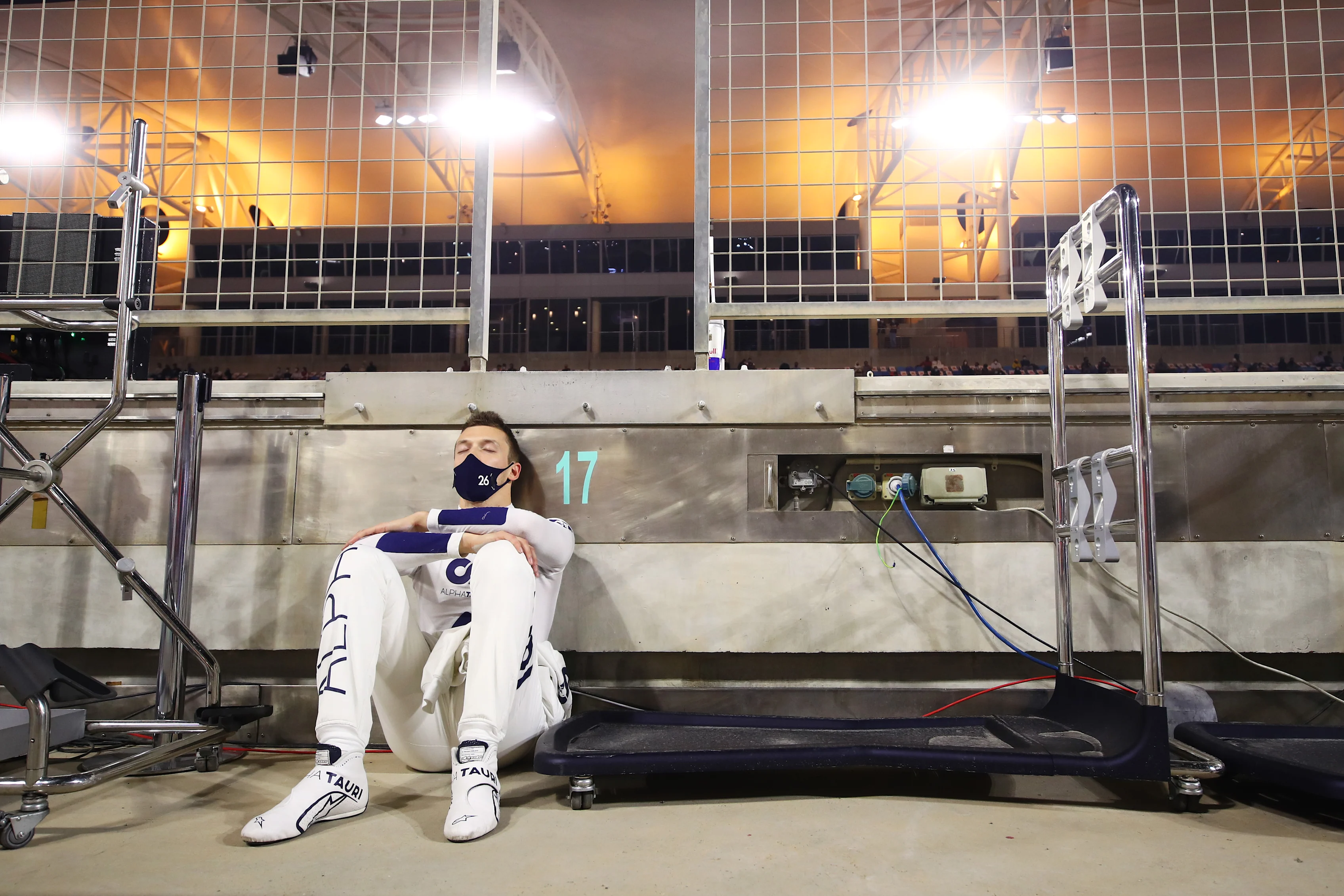 BAHRAIN, BAHRAIN - NOVEMBER 29: Daniil Kvyat of Russia and Scuderia AlphaTauri sits in the Pitlane following a red flag delay during the F1 Grand Prix of Bahrain at Bahrain International Circuit on November 29, 2020 in Bahrain, Bahrain. (Photo by Mark Thompson/Getty Images)