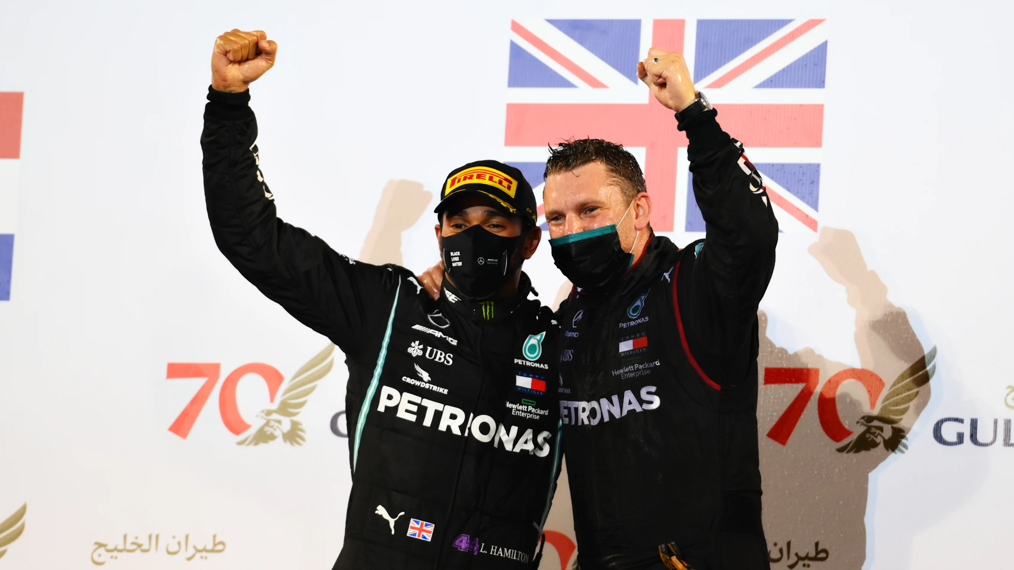 BAHRAIN, BAHRAIN - NOVEMBER 29: Race winner Lewis Hamilton of Great Britain and Mercedes GP celebrates on the podium during the F1 Grand Prix of Bahrain at Bahrain International Circuit on November 29, 2020 in Bahrain, Bahrain. (Photo by Clive Mason - Formula 1/Formula 1 via Getty Images)