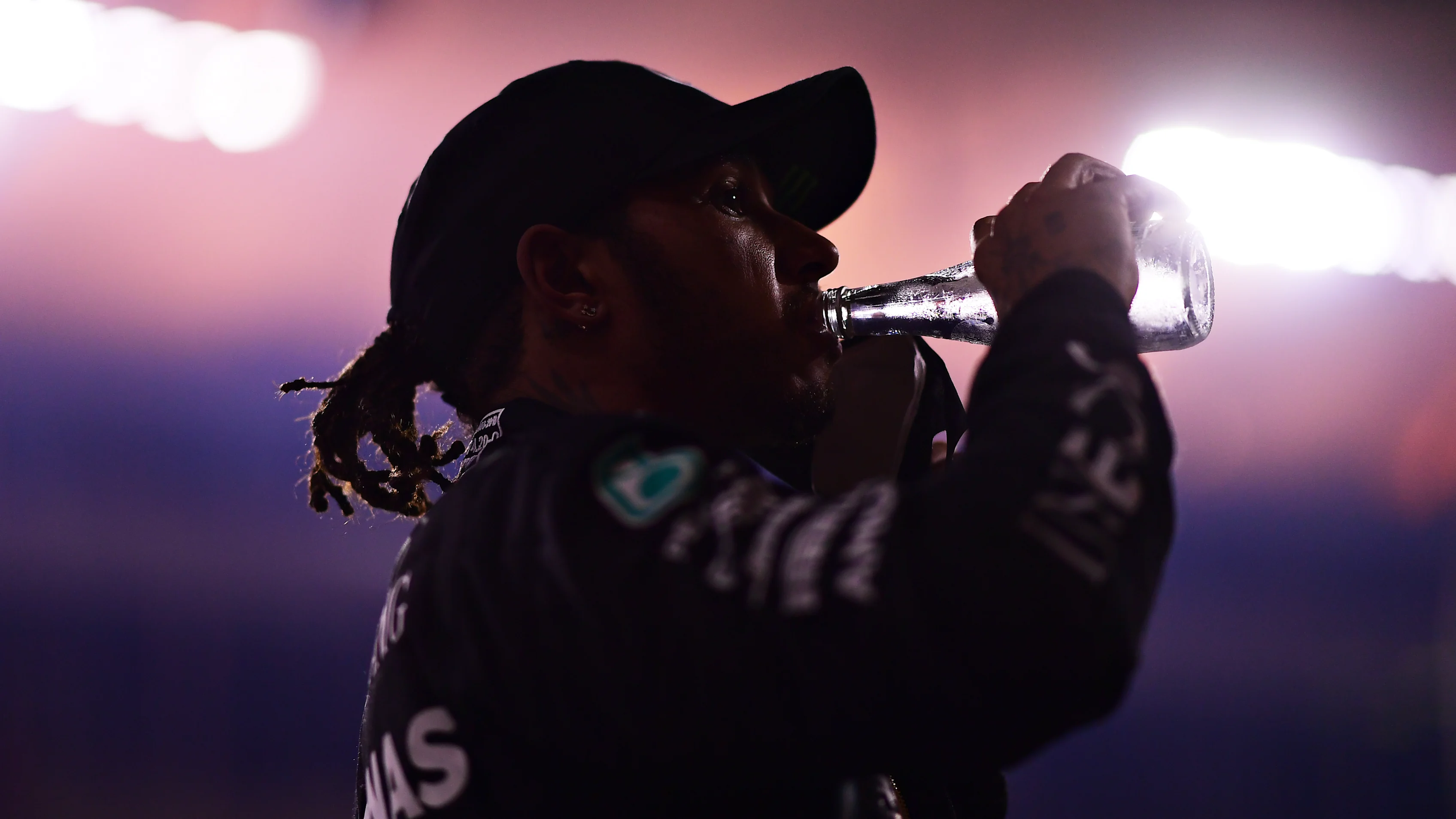 BAHRAIN, BAHRAIN - NOVEMBER 29: Race winner Lewis Hamilton of Great Britain and Mercedes GP takes a