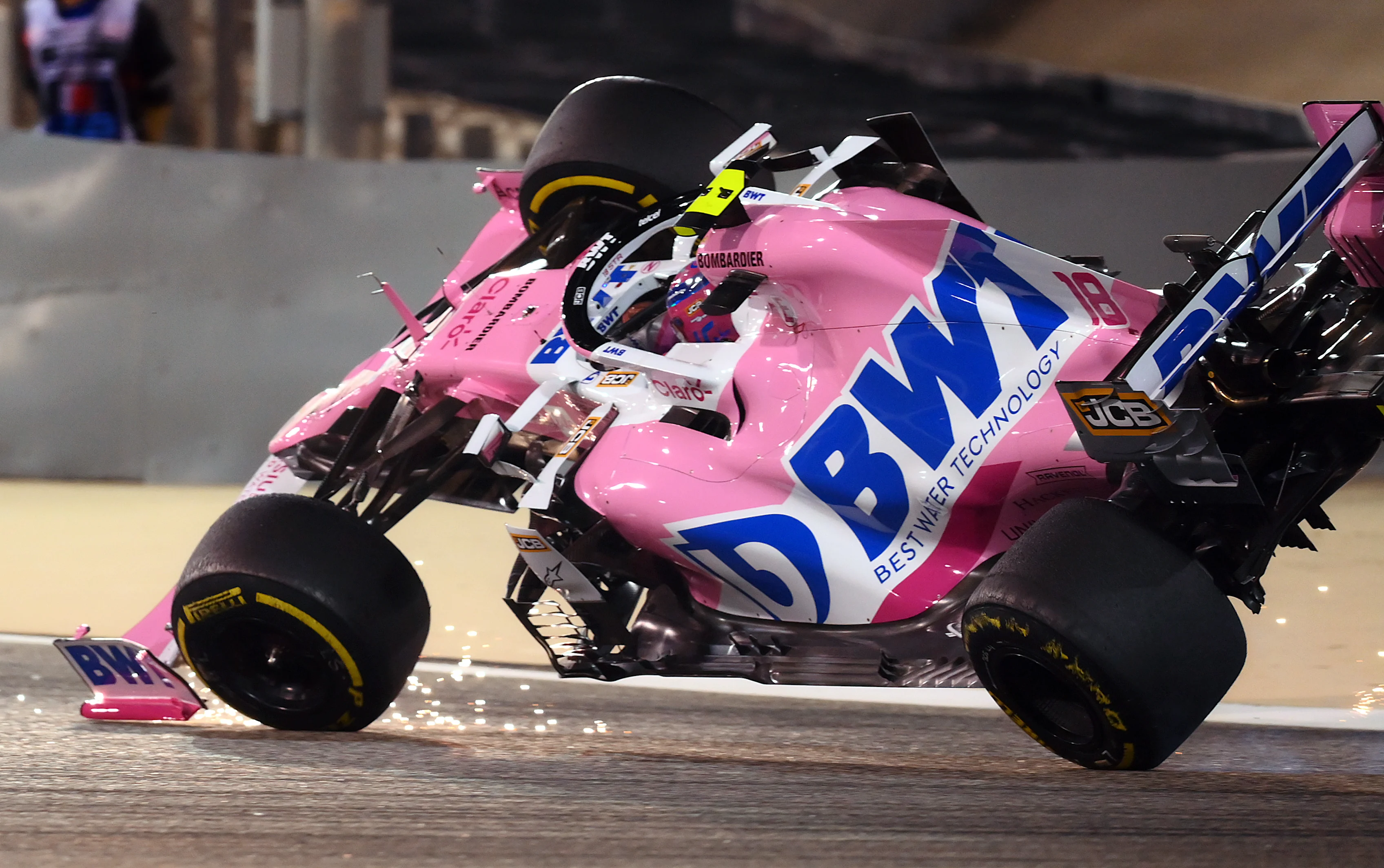 BAHRAIN, BAHRAIN - NOVEMBER 29: Lance Stroll of Canada driving the (18) Racing Point RP20 Mercedes is launched upside down following a crash during the F1 Grand Prix of Bahrain at Bahrain International Circuit on November 29, 2020 in Bahrain, Bahrain. (Photo by Clive Mason - Formula 1/Formula 1 via Getty Images)