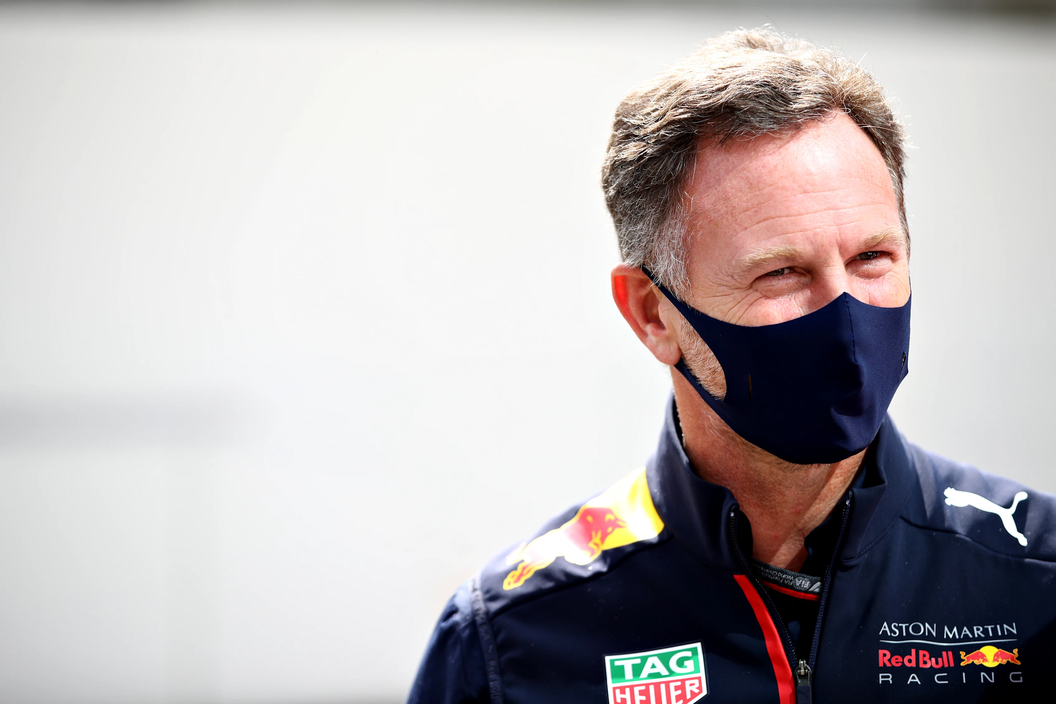 SPA, BELGIUM - AUGUST 30: Red Bull Racing Team Principal Christian Horner looks on in the Paddock