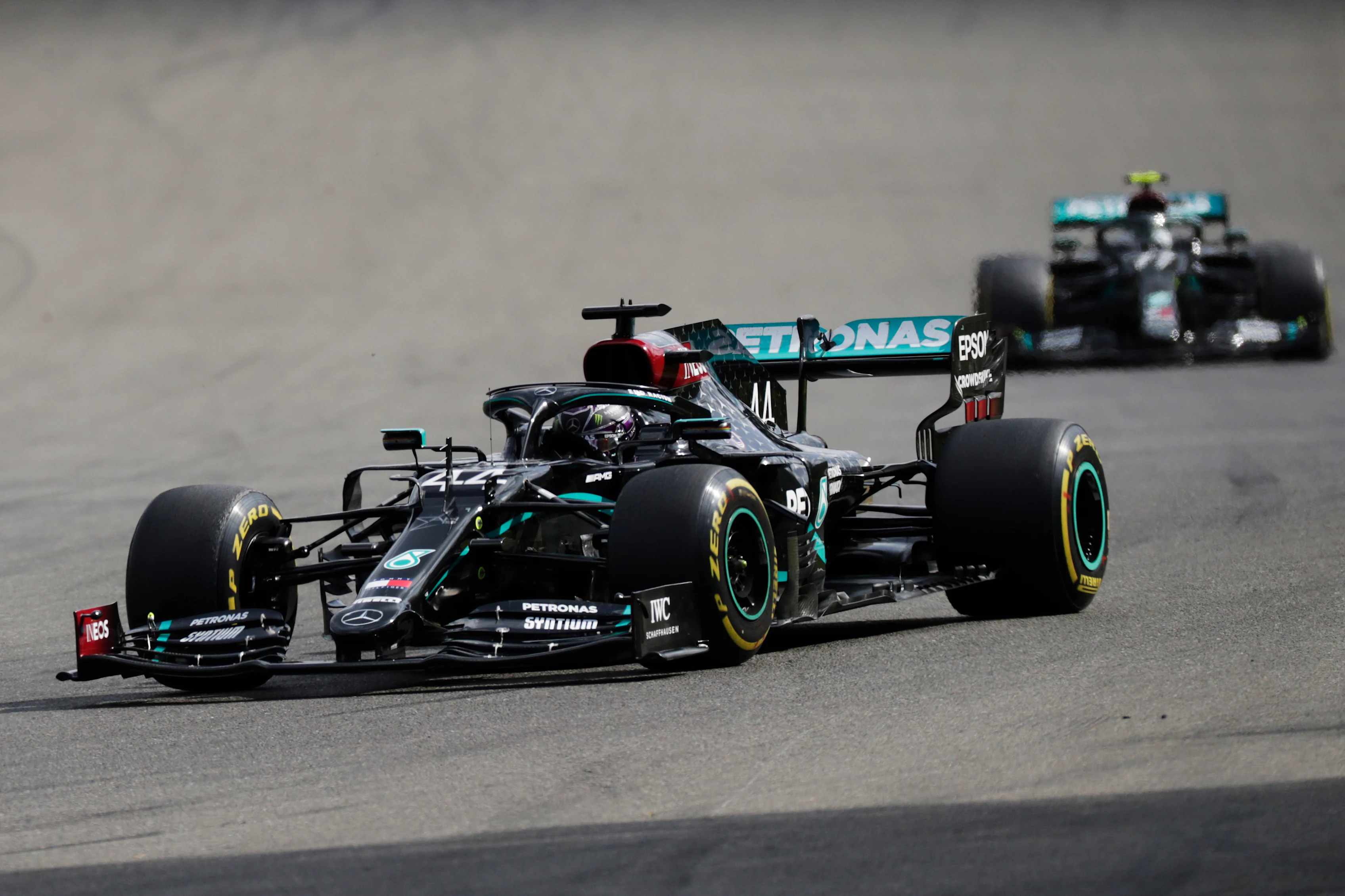 SPA, BELGIUM - AUGUST 30: Lewis Hamilton of Great Britain driving the (44) Mercedes AMG Petronas F1 Team Mercedes W11 leads Valtteri Bottas of Finland driving the (77) Mercedes AMG Petronas F1 Team Mercedes W11 during the F1 Grand Prix of Belgium at Circuit de Spa-Francorchamps on August 30, 2020 in Spa, Belgium. (Photo by Stephanie Lecocq/Pool via Getty Images)