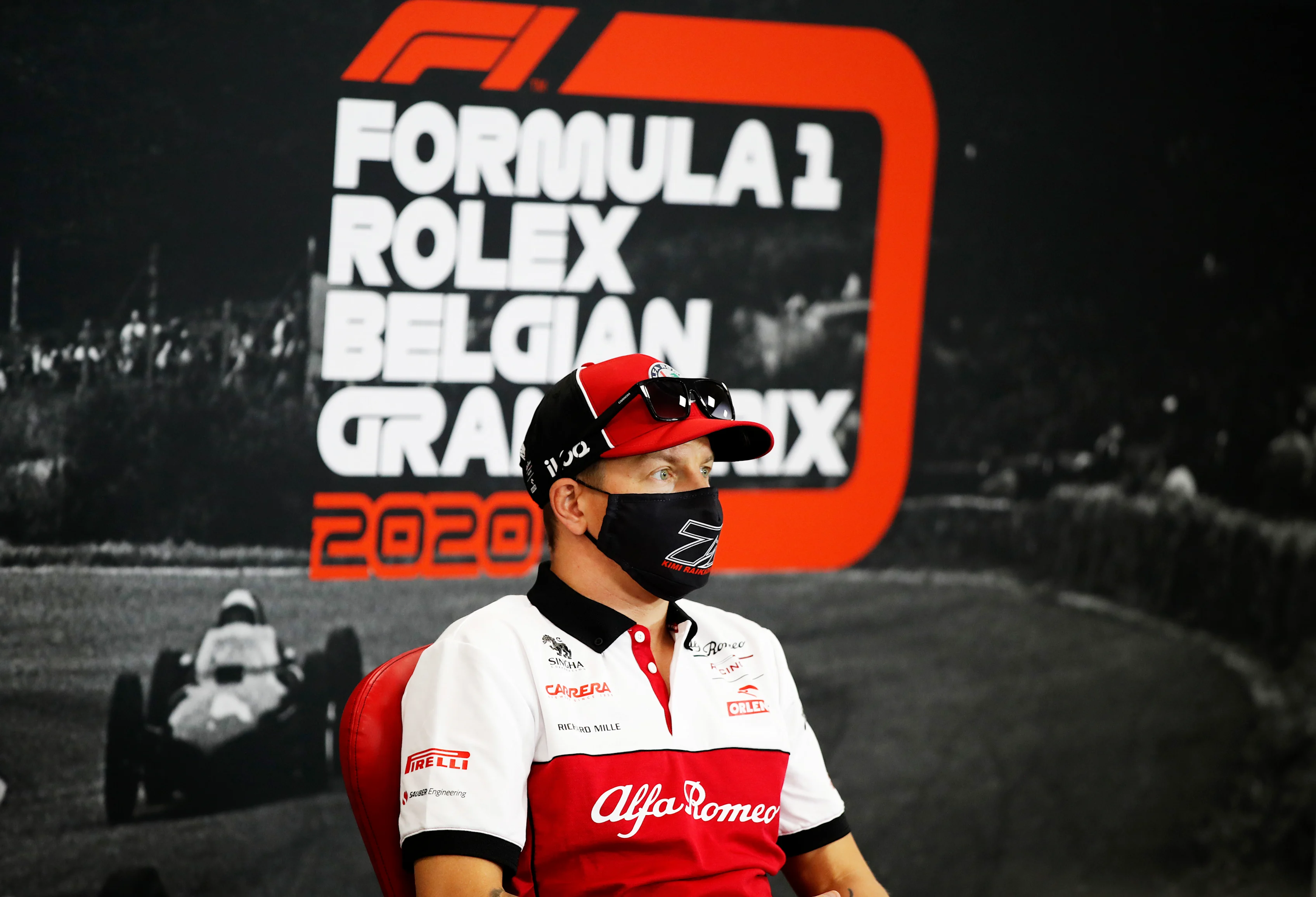 SPA, BELGIUM - AUGUST 27: Kimi Raikkonen of Finland and Alfa Romeo Racing talks in the Drivers