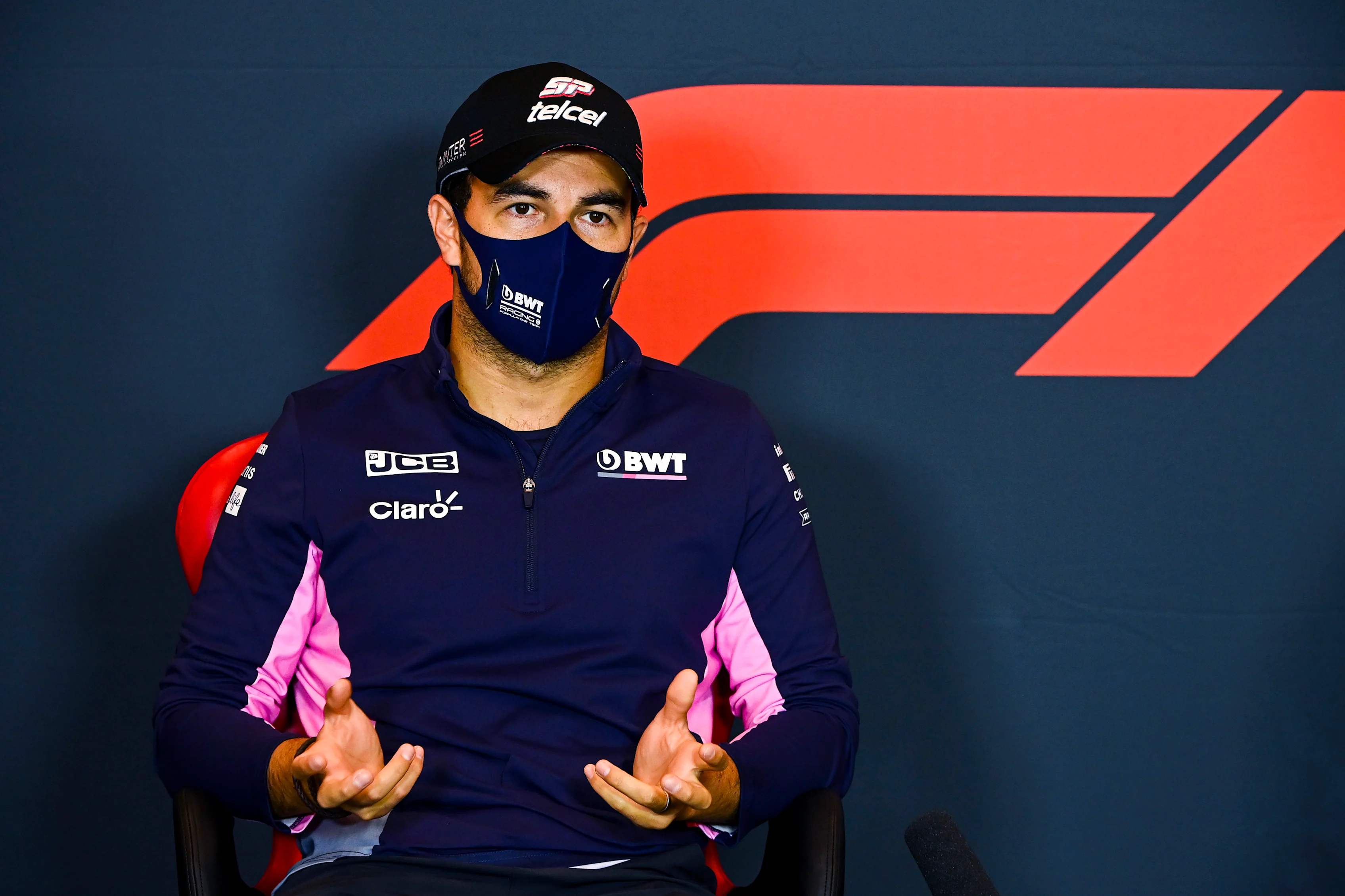 IMOLA, ITALY - OCTOBER 30: Sergio Perez of Mexico and Racing Point talks in the Drivers Press