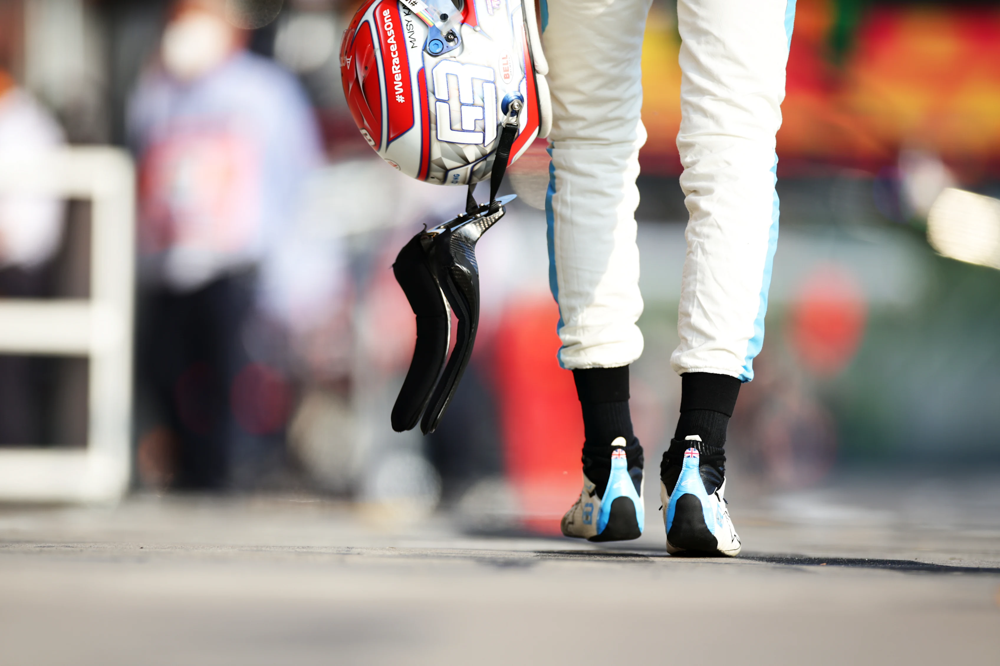 IMOLA, ITALY - OCTOBER 31: George Russell of Great Britain and Williams walks in the Pitlane during