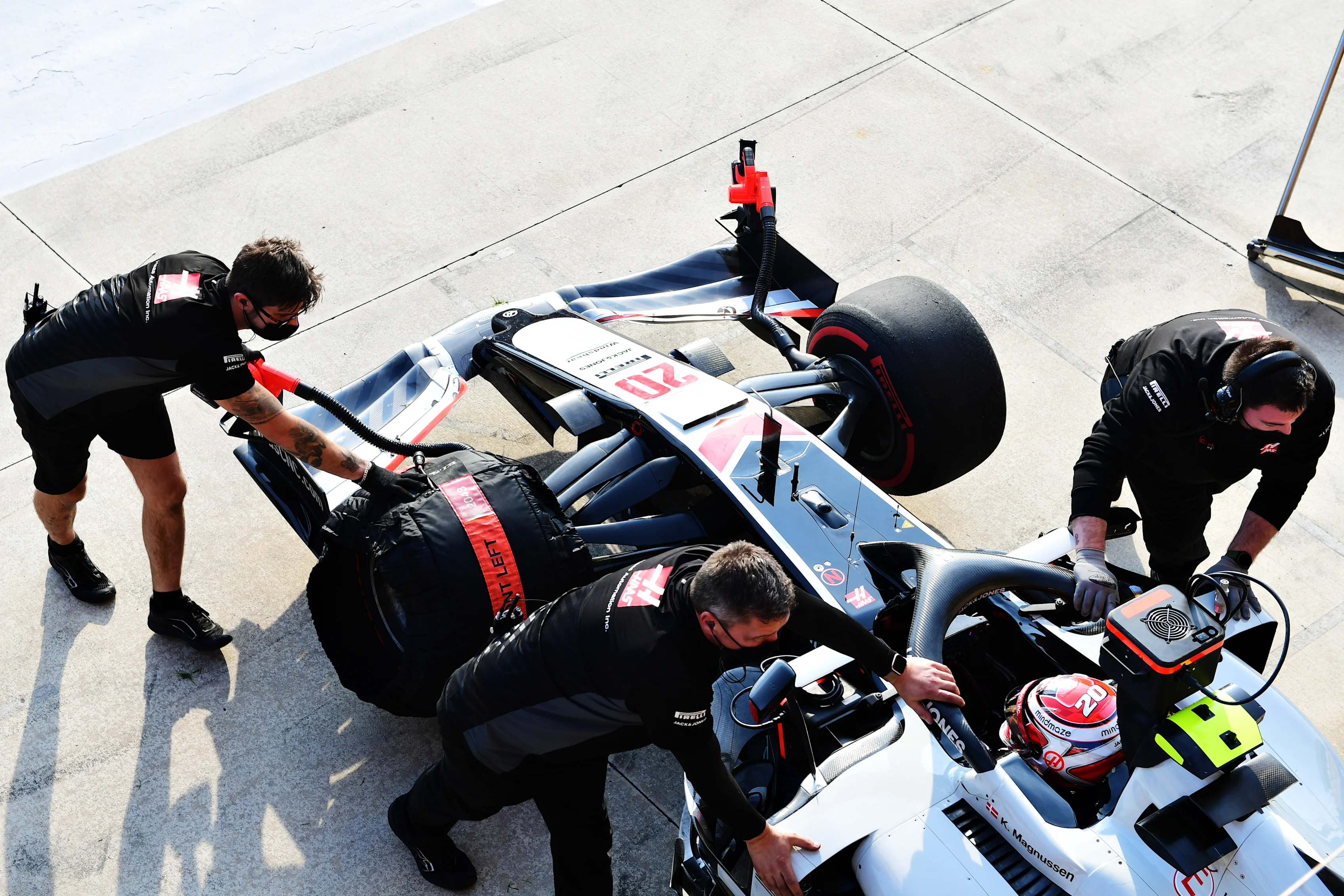 IMOLA, ITALY - OCTOBER 31: Kevin Magnussen of Denmark driving the (20) Haas F1 Team VF-20 Ferrari stops in the Pitlane during qualifying ahead of the F1 Grand Prix of Emilia Romagna at Autodromo Enzo e Dino Ferrari on October 31, 2020 in Imola, Italy. (Photo by Jennifer Lorenzini - Pool/Getty Images)