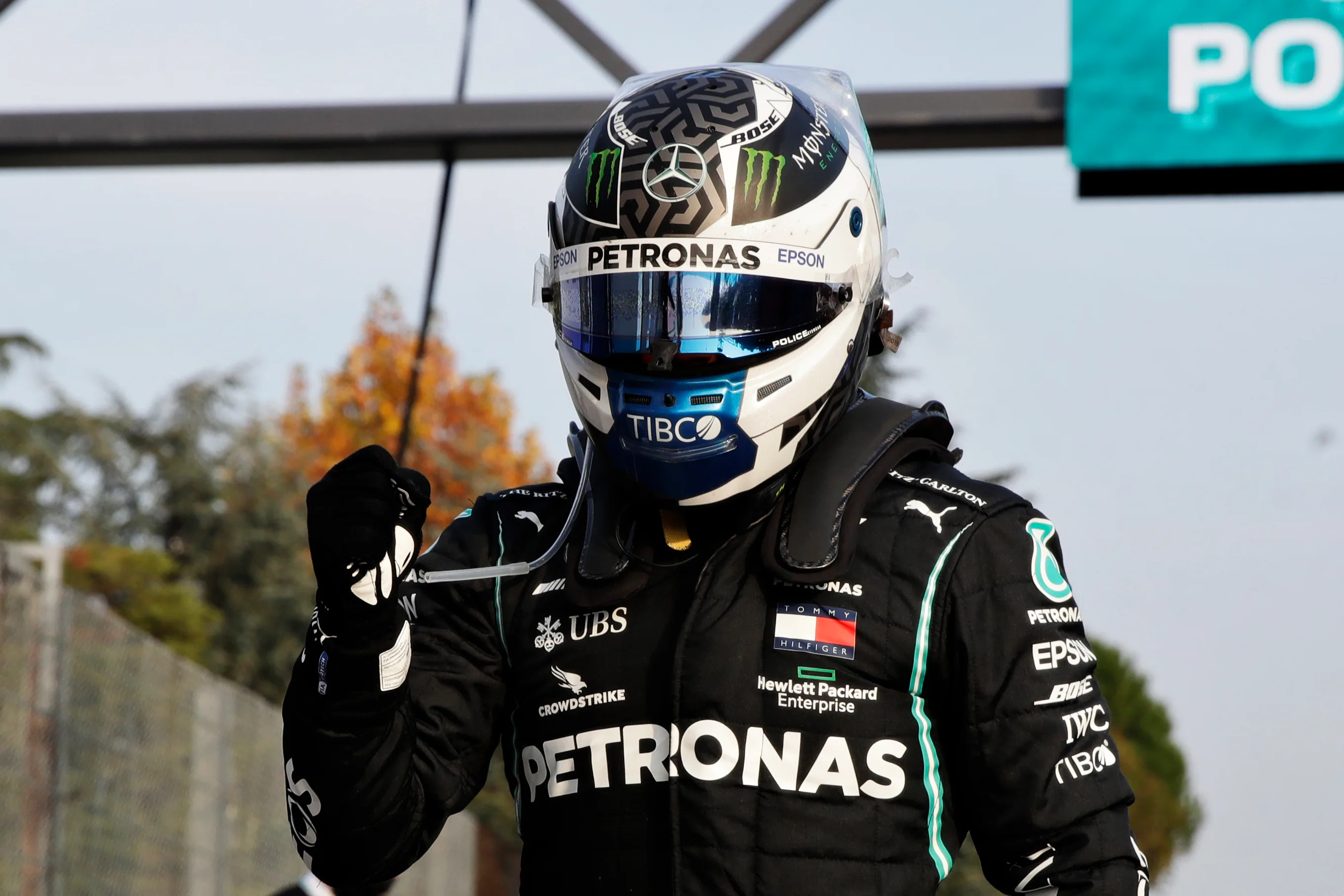 IMOLA, ITALY - OCTOBER 31: Pole position qualifier Valtteri Bottas of Finland and Mercedes GP climbs from his car in parc ferme during qualifying ahead of the F1 Grand Prix of Emilia Romagna at Autodromo Enzo e Dino Ferrari on October 31, 2020 in Imola, Italy. (Photo by Luca Bruno - Pool/Getty Images)