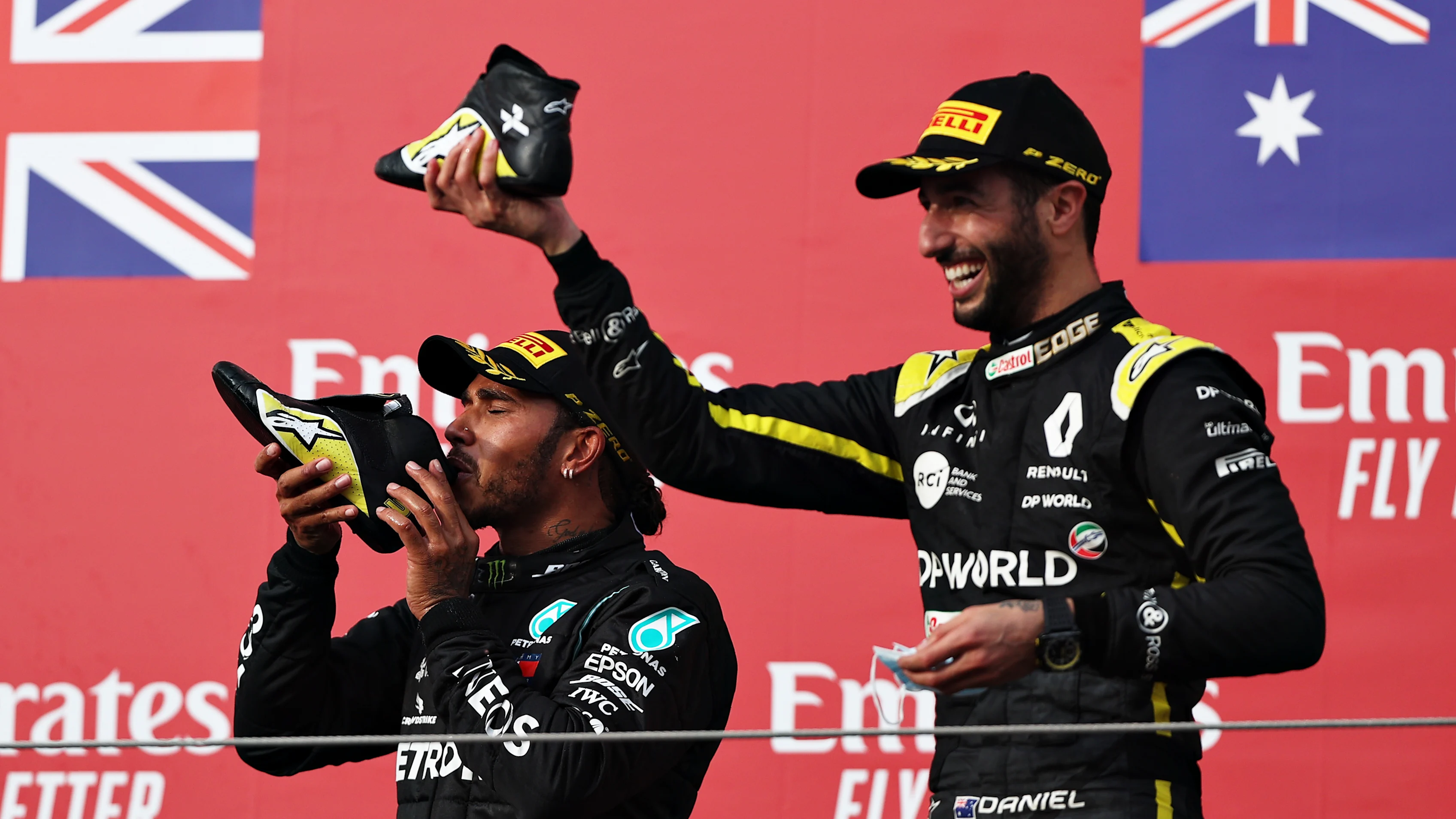 IMOLA, ITALY - NOVEMBER 01: Race winner Lewis Hamilton of Great Britain and Mercedes GP and third placed Daniel Ricciardo of Australia and Renault Sport F1 celebrate on the podium during the F1 Grand Prix of Emilia Romagna at Autodromo Enzo e Dino Ferrari on November 01, 2020 in Imola, Italy. (Photo by Lars Baron - Formula 1/Formula 1 via Getty Images)