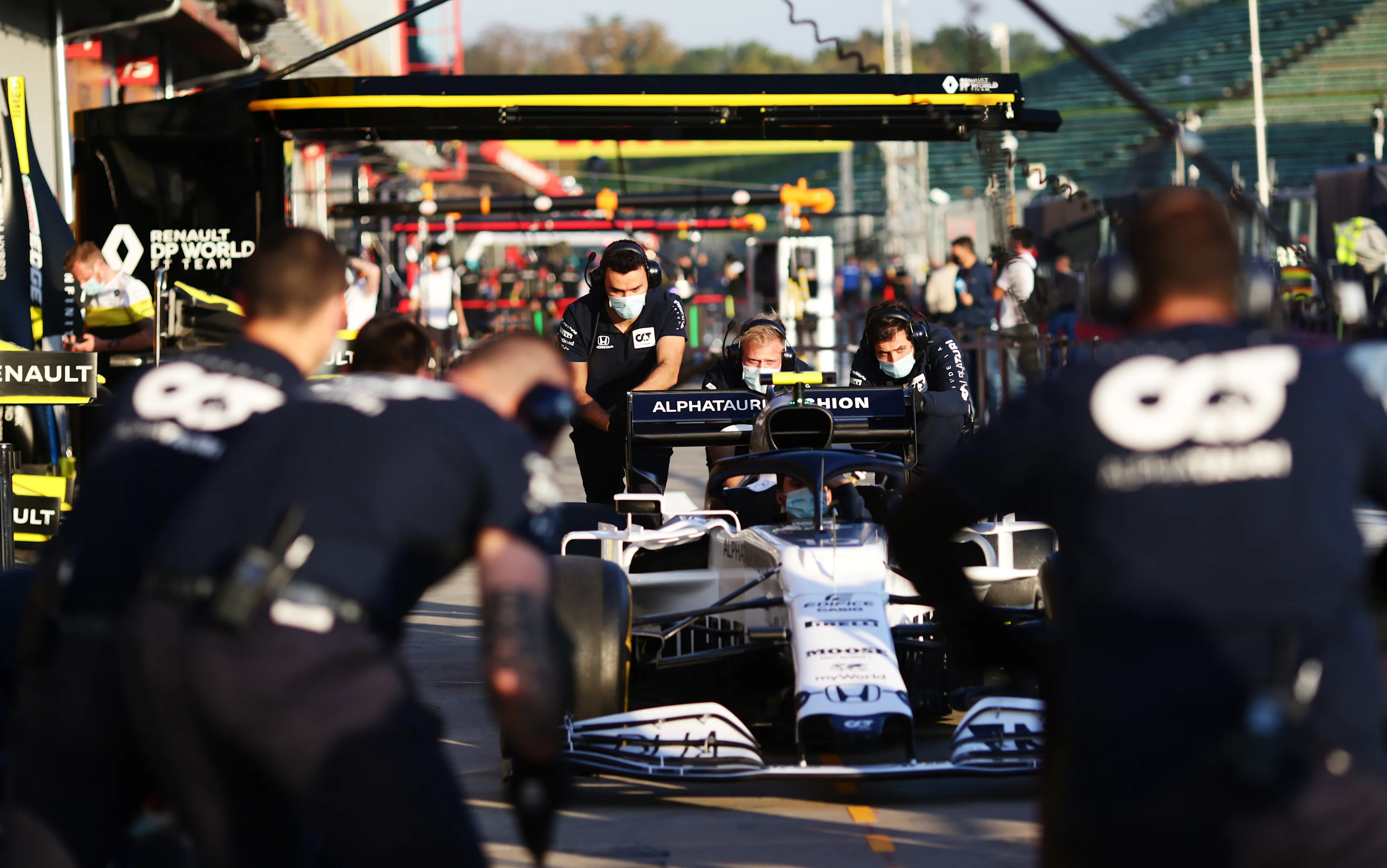 IMOLA, ITALY - OCTOBER 30: Scuderia AlphaTauri team practice pitstops during previews ahead of the