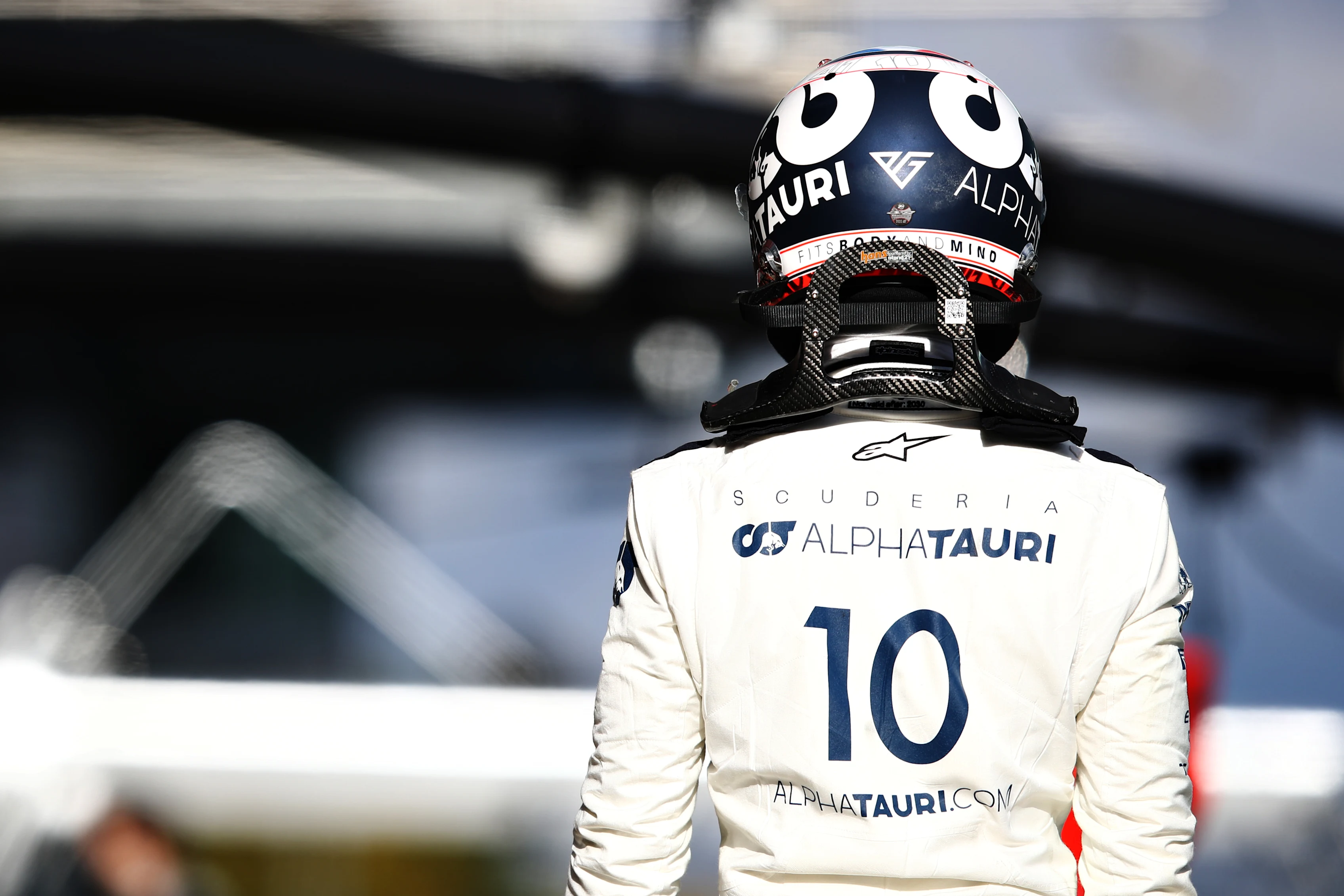 NUERBURG, GERMANY - OCTOBER 10: Pierre Gasly of France and Scuderia AlphaTauri walks in the Pitlane