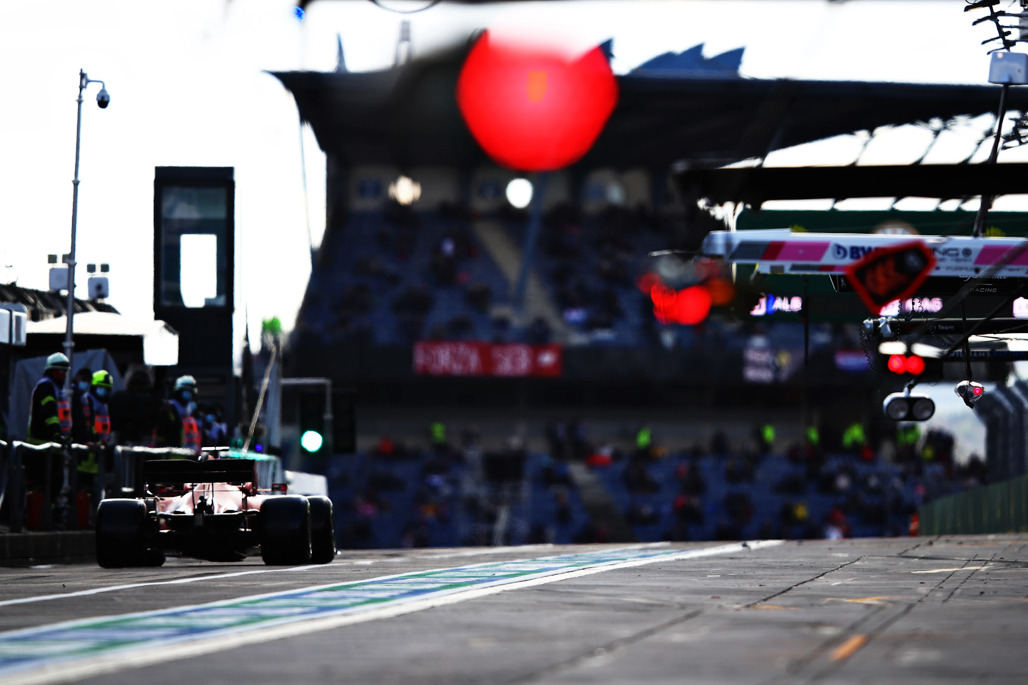 NUERBURG, GERMANY - OCTOBER 10: Sebastian Vettel of Germany driving the (5) Scuderia Ferrari SF1000