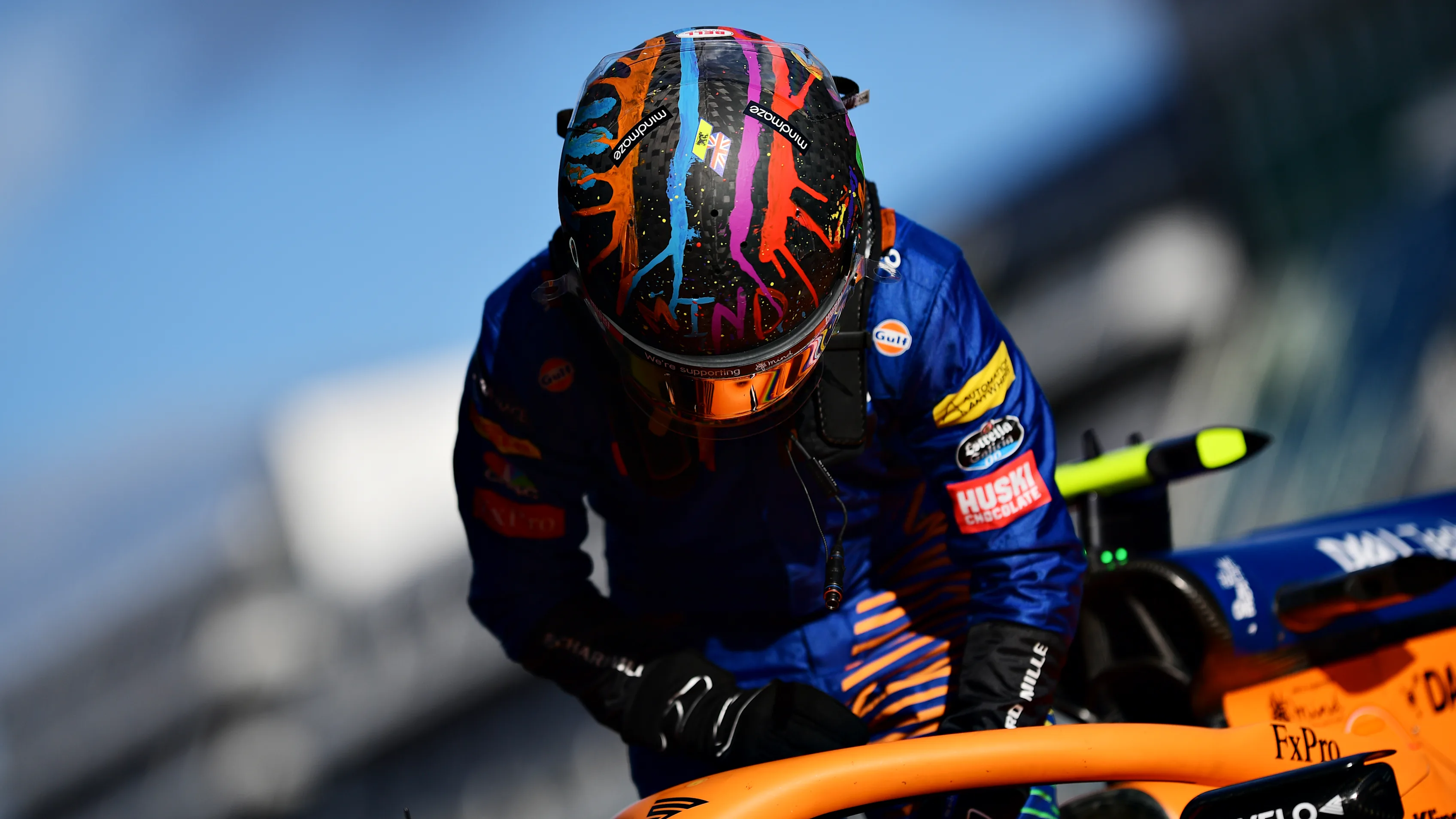 NUERBURG, GERMANY - OCTOBER 10: Lando Norris of Great Britain and McLaren F1 climbs from his car in